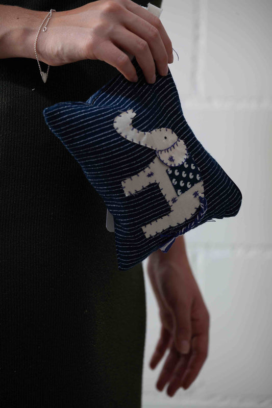SilaiWali handcrafted vanity pouch made from upcycled fabric, sewn by Afghan refugee women