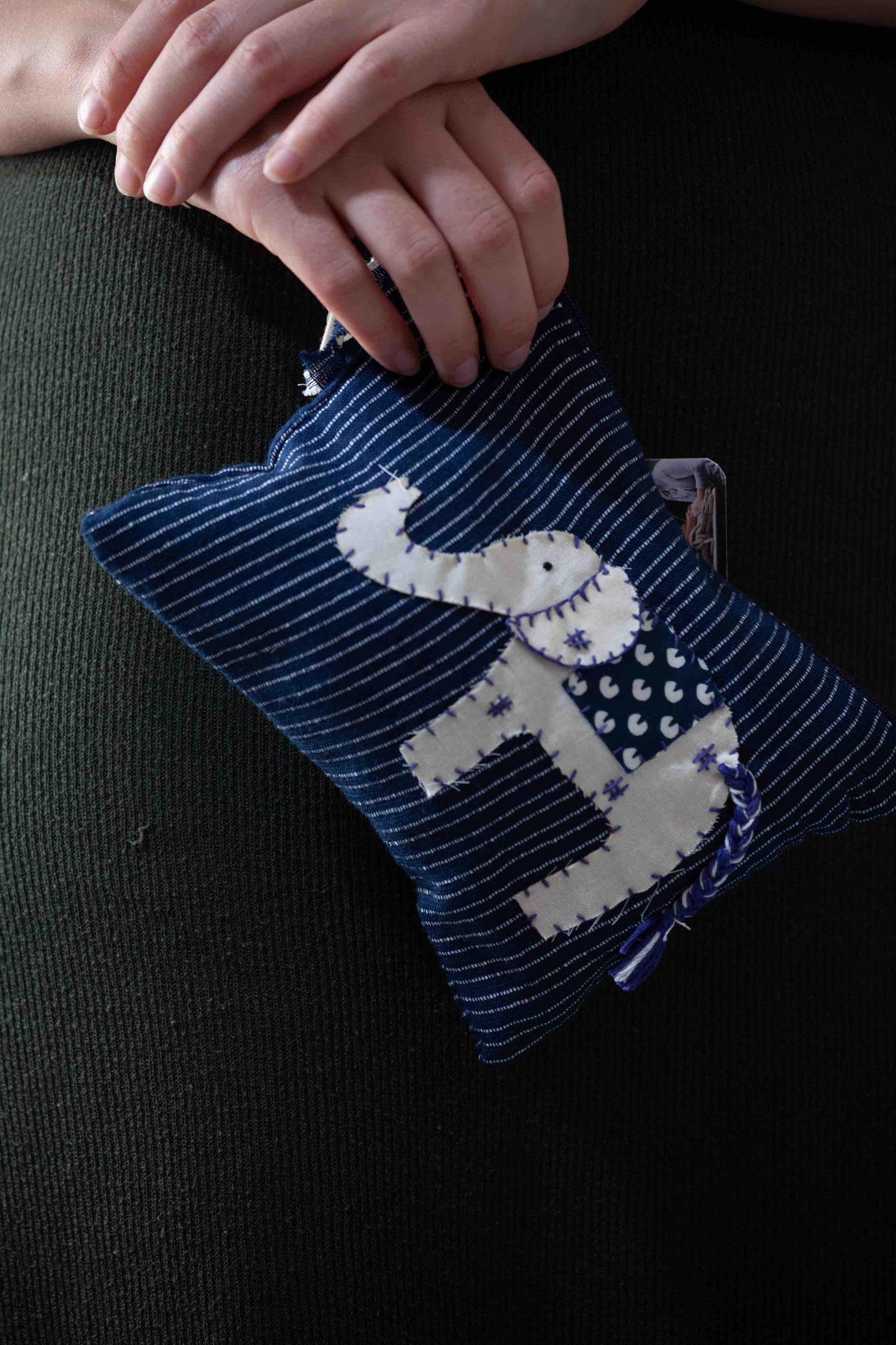 SilaiWali handcrafted vanity pouch made from upcycled fabric, sewn by Afghan refugee women