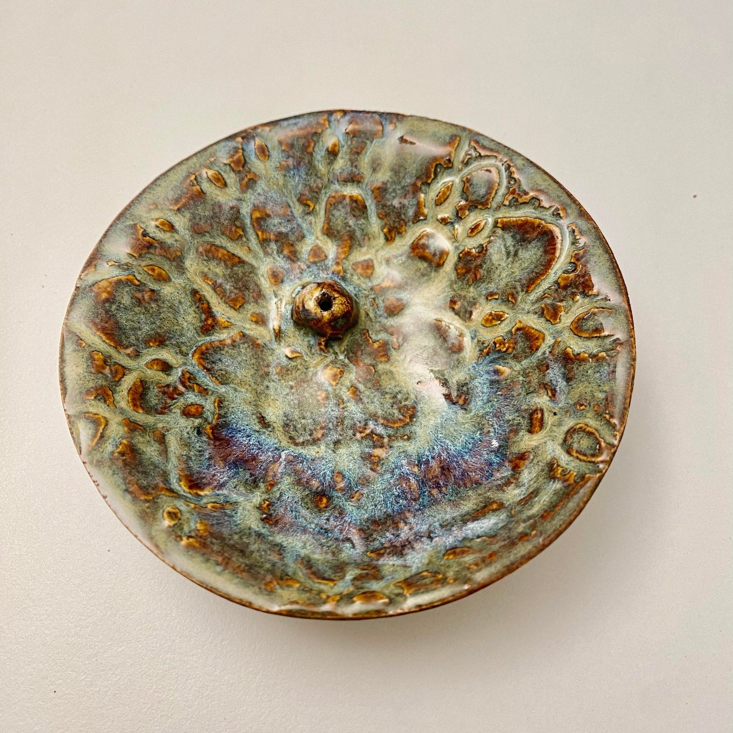 Handmade ceramic incense holder by The Goddess Collective, suitable for Japanese-style and bamboo core incense sticks. Available at House of Woven Stories.