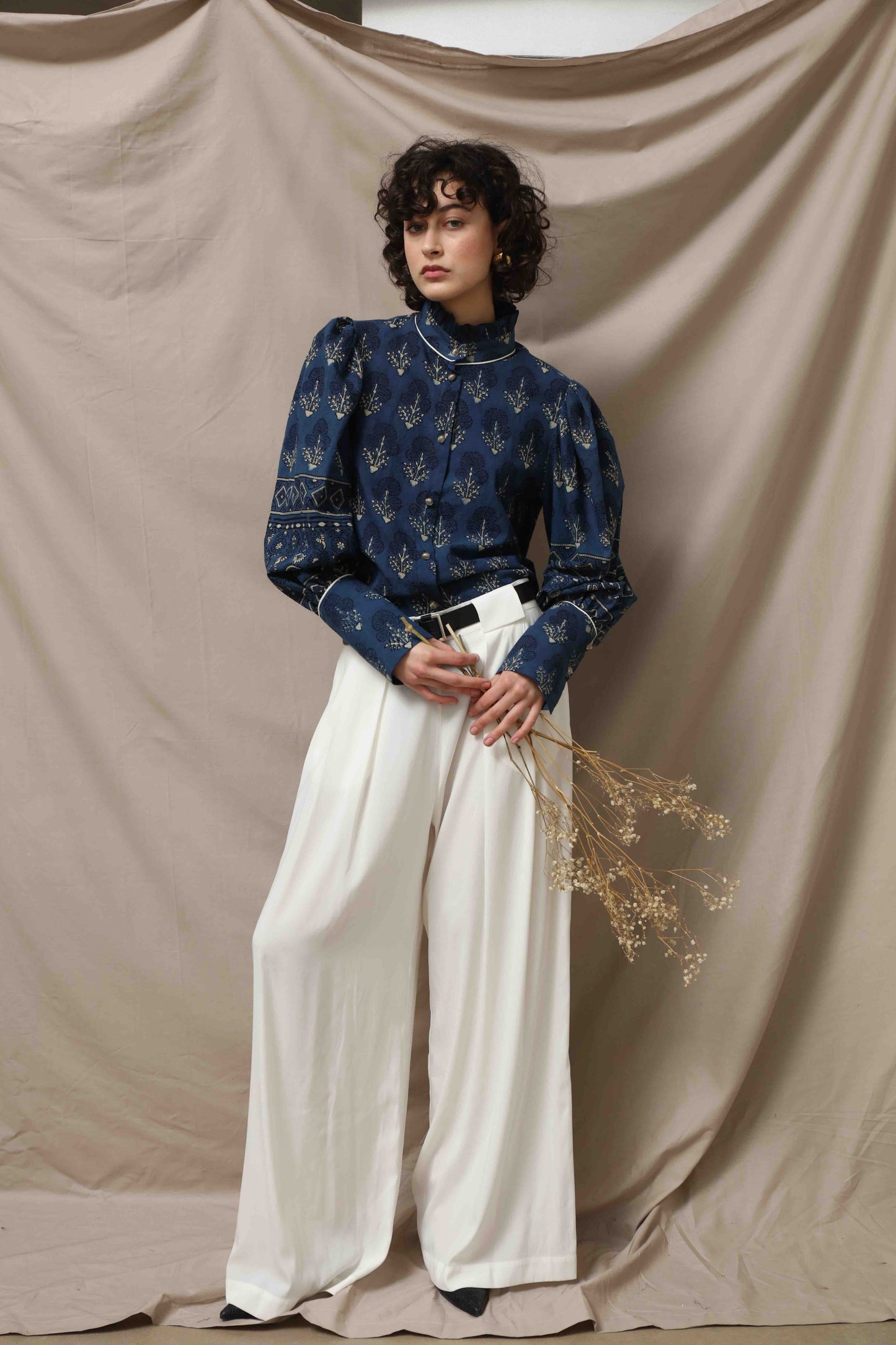Karin blouse made from 100% organic cotton with Ajrakh blockprint in natural indigo blue, featuring volant detail, handcrafted by House of Woven Stories.