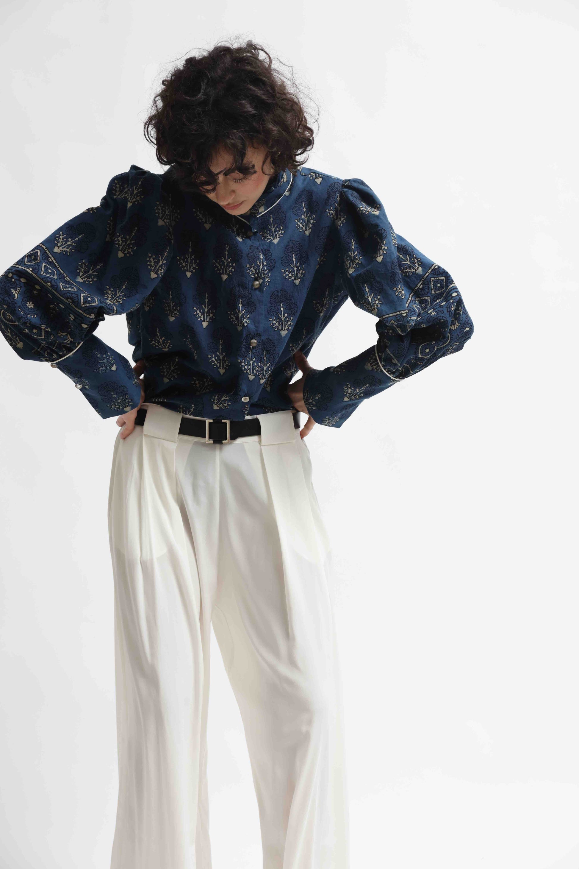 Karin blouse made from 100% organic cotton with Ajrakh blockprint in natural indigo blue, featuring volant detail, handcrafted by House of Woven Stories.
