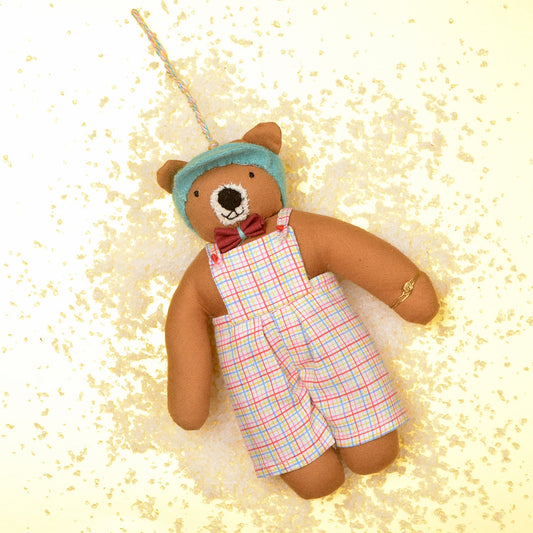 Bear-shaped hanging charm handcrafted from upcycled fabric by SilaiWali, made by Afghan refugee women in India. Available at House of Woven Stories.