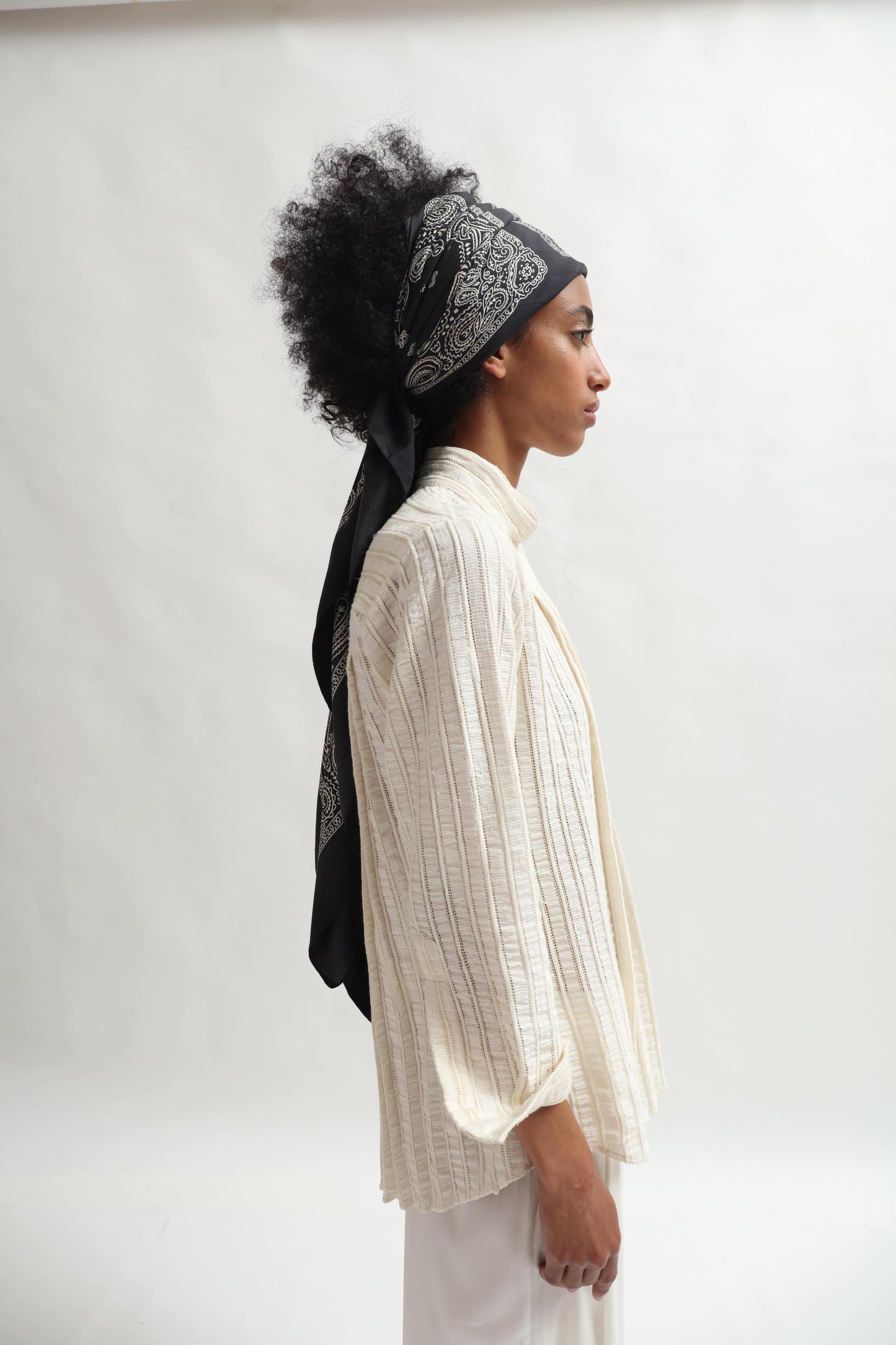 Leno Pleated Shirt by Paiwand made from upcycled cotton with breathable leno weave, featuring elegant pleats and handcrafted in India. Sustainable fashion curated by House of Woven Stories.
