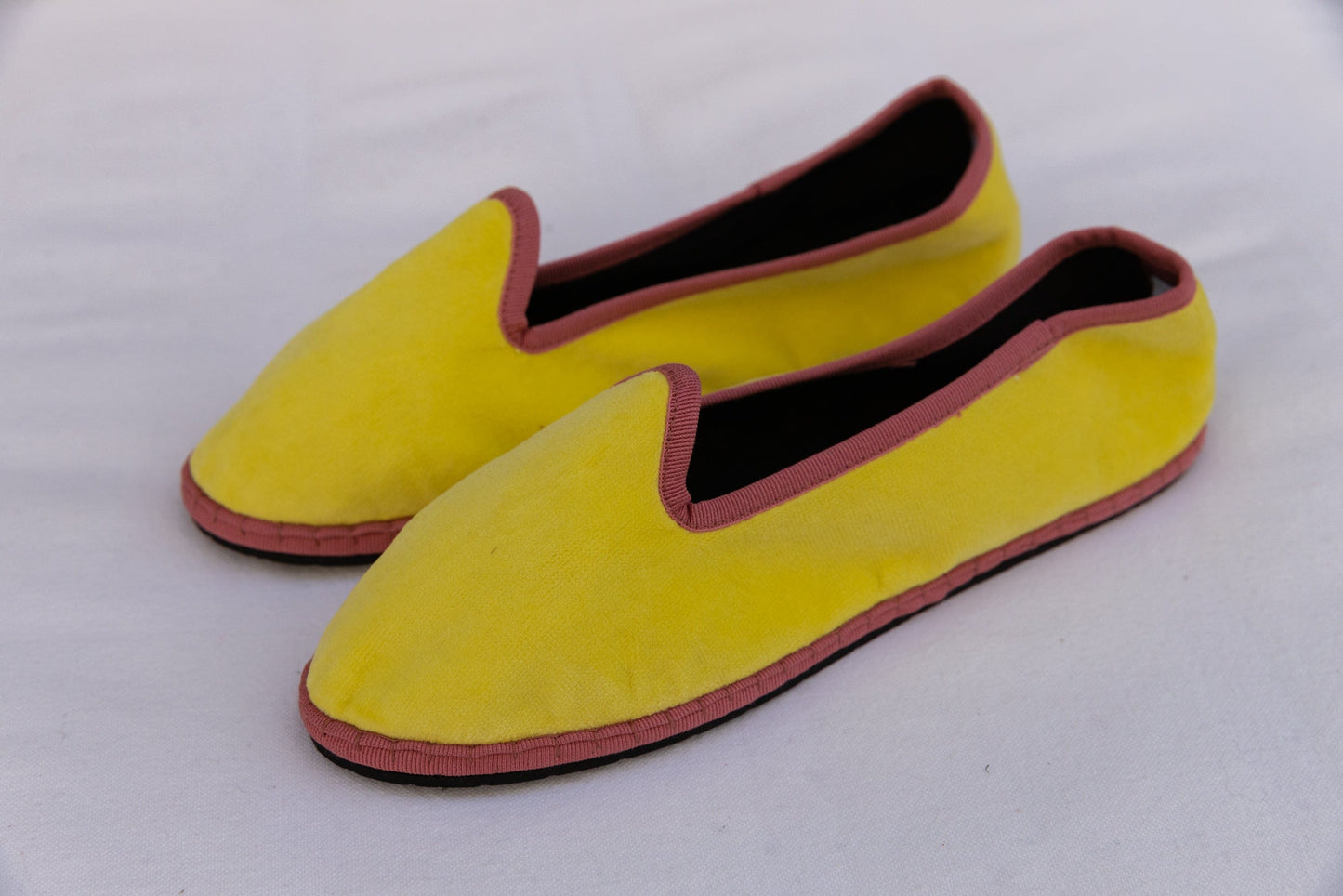 Handmade in Venice from upcycled luxury fabrics with recycled rubber soles. Lime and Strawberry Venetian Slippers by Teod’amar are timeless and sustainable. Part of House of Woven Stories section. 