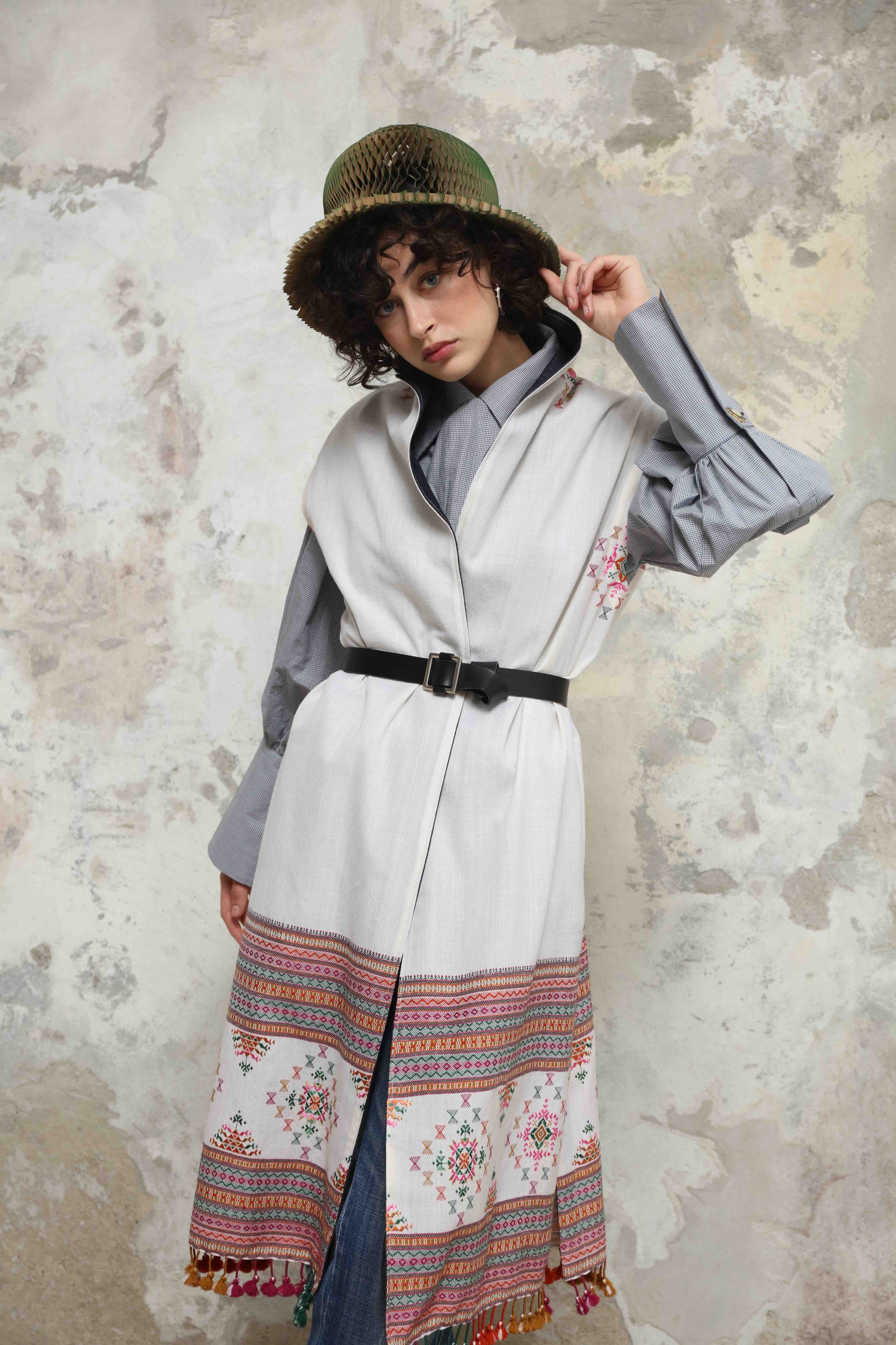 Blauj Gilet by House of Woven Stories – unique merino wool vest with colorful details and fringe hem, handcrafted in Italy using ethically sourced fabrics from India.