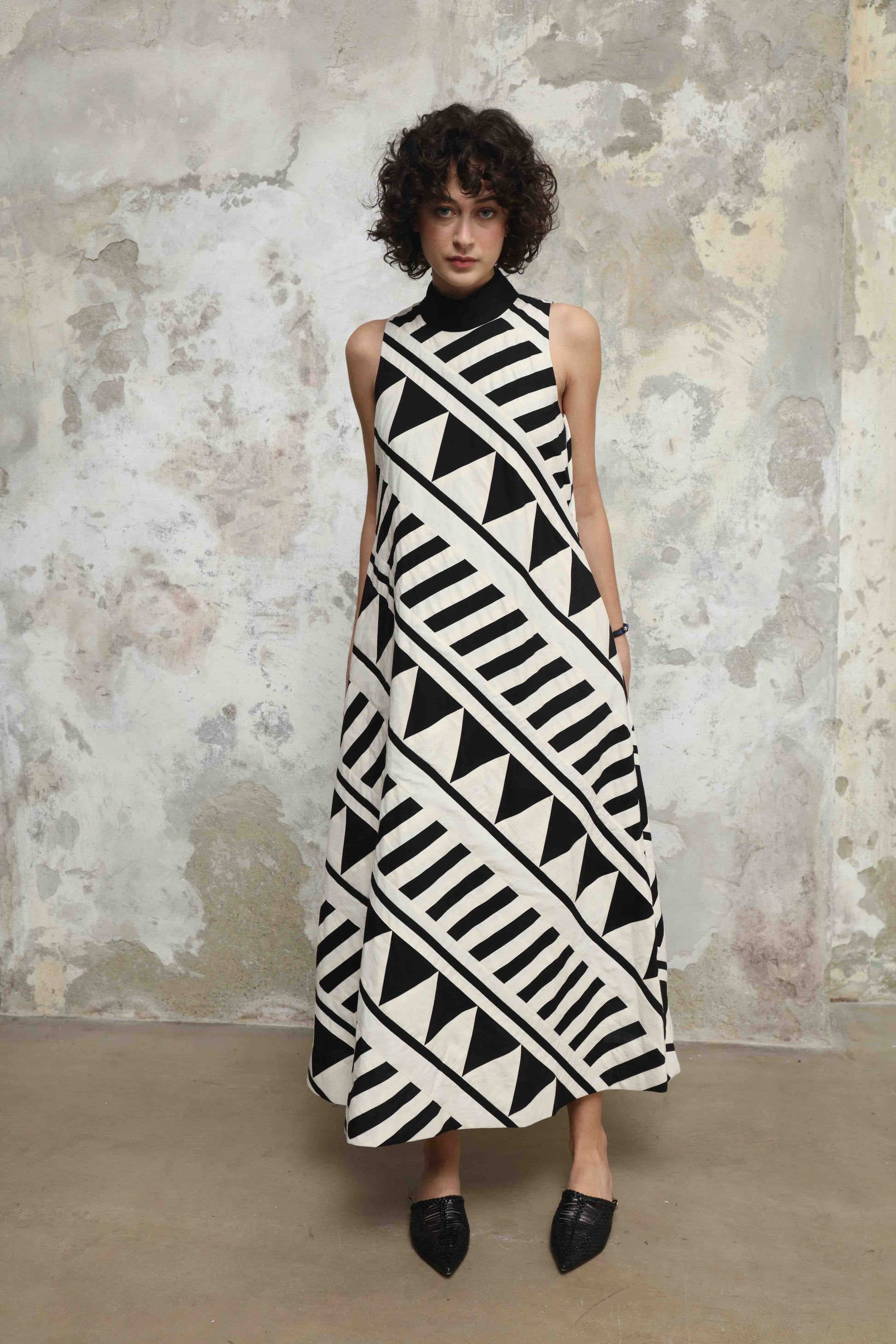 Lino Dress by Ka-Sha – handcrafted A-line cotton dress with black and white appliqué detailing, 46" length, and a relaxed, elegant silhouette. Part of the House of Woven Stories selection.