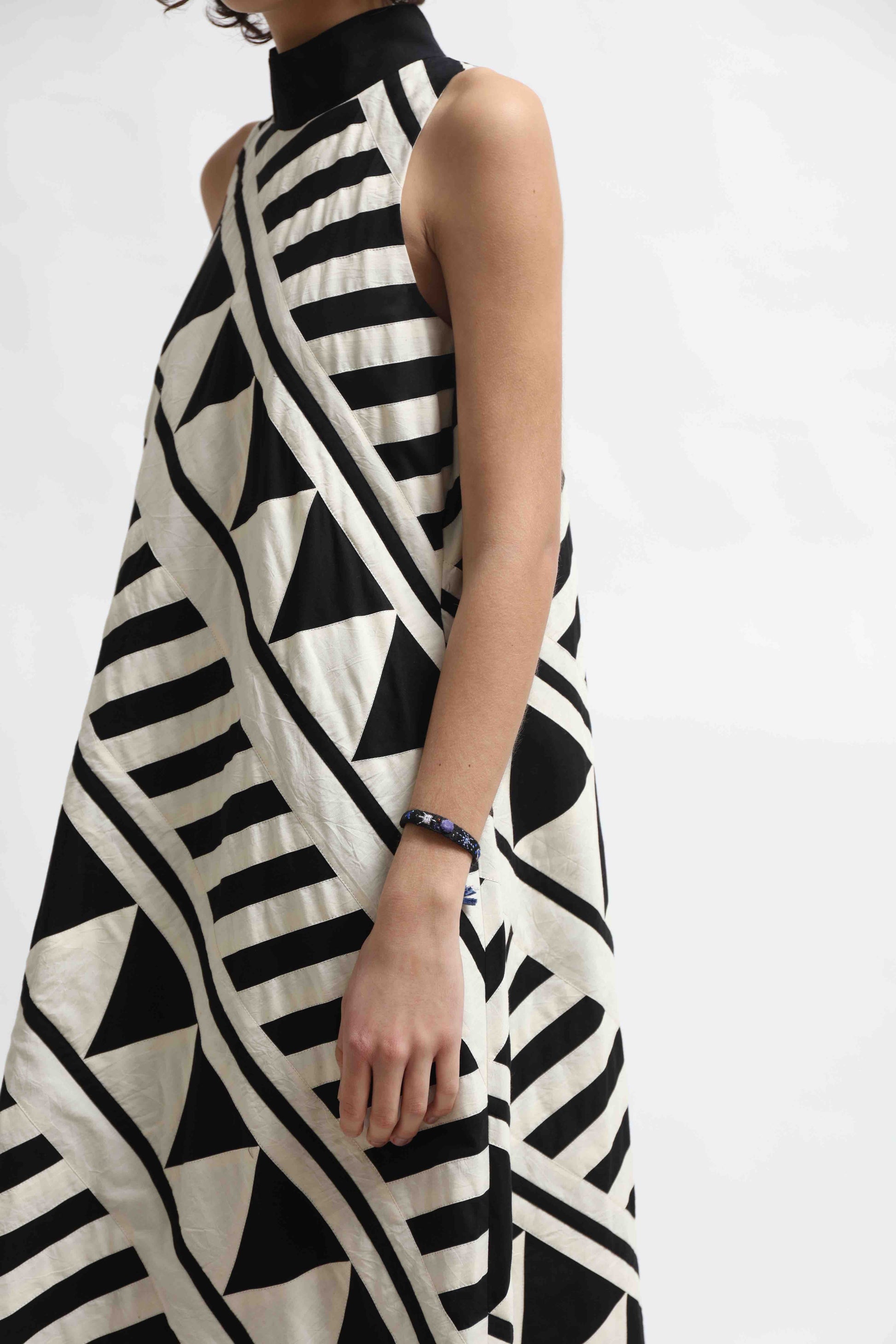 Lino Dress by Ka-Sha – handcrafted A-line cotton dress with black and white appliqué detailing, 46" length, and a relaxed, elegant silhouette. Part of the House of Woven Stories selection.