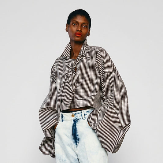 Maison Jejia Aliss Shirt in black and white check with oversized sculptural sleeves, wide cuffs and a cropped silhouette, curated by House of Nomad Stories