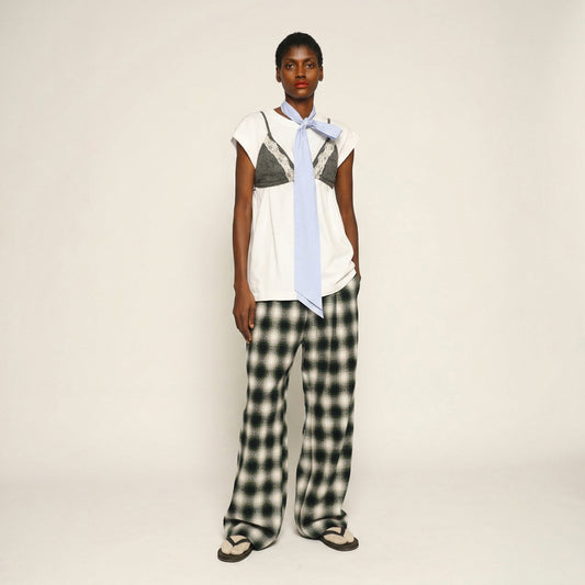 Maison Jejia Norma Check Pant in graphic black and white check with a relaxed fit and fluid wide leg silhouette curated by House of Nomad Stories