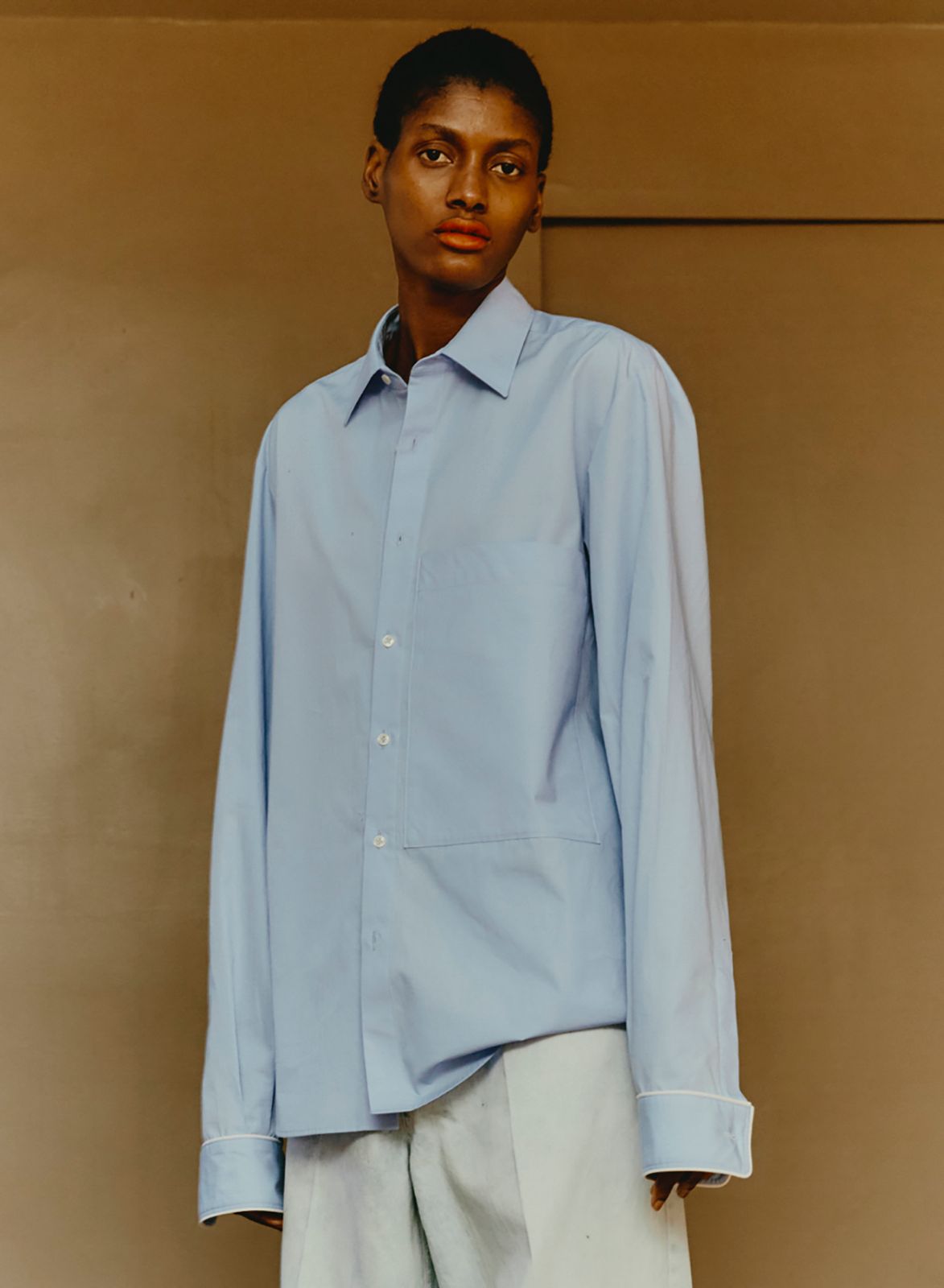 Maison Jejia Mami Shirt in pale blue with a pointed collar, button front and relaxed elongated silhouette, curated by House of Nomad Stories
