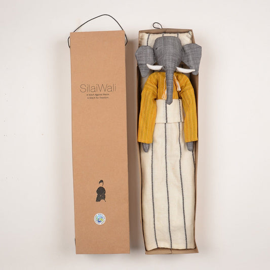 Handcrafted elephant cloth doll named Mumba by SilaiWali, made from upcycled fabric, featuring eco-friendly design. Available at House of Woven Stories
