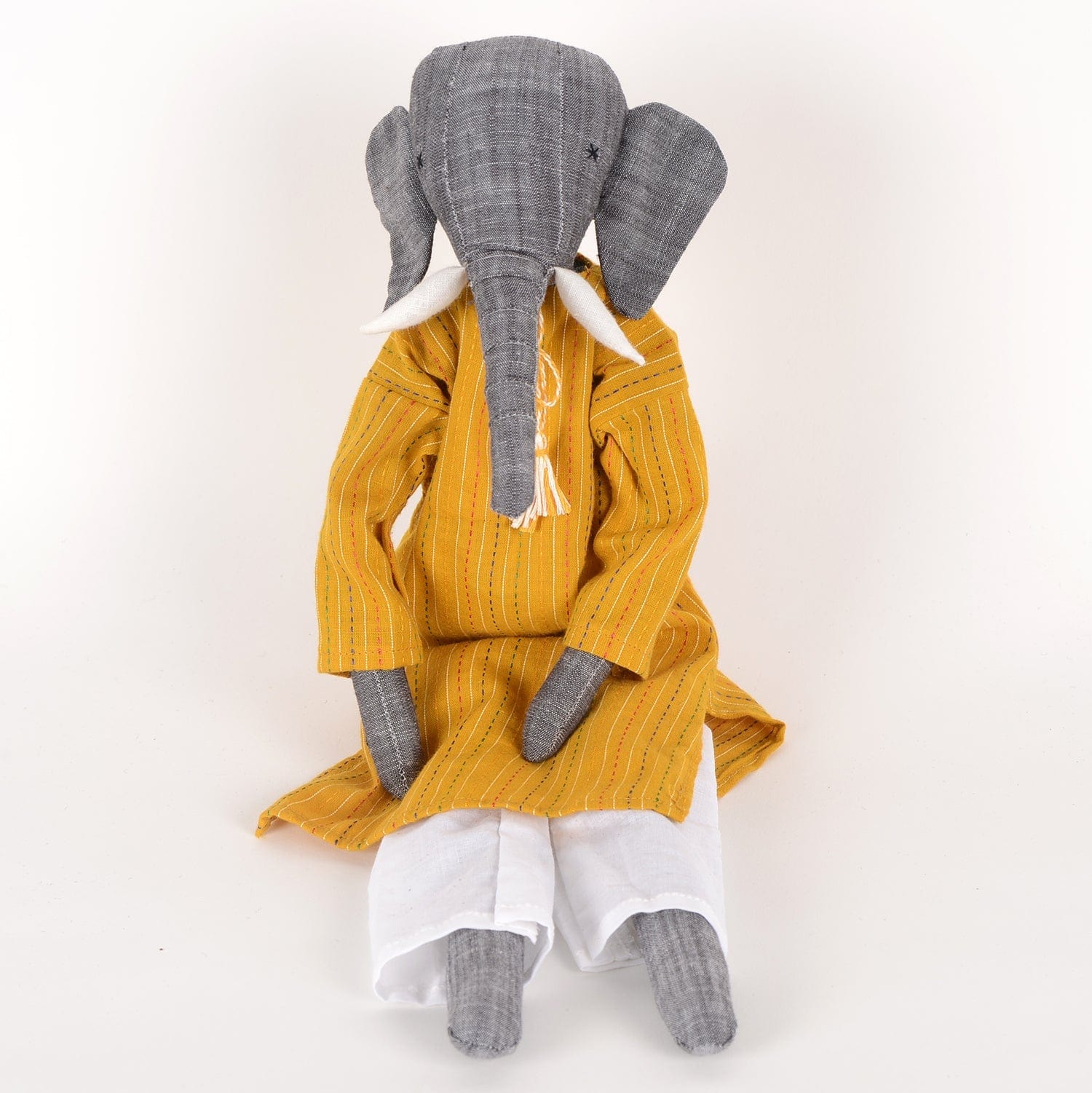 Handcrafted elephant cloth doll named Mumba by SilaiWali, made from upcycled fabric, featuring eco-friendly design. Available at House of Woven Stories