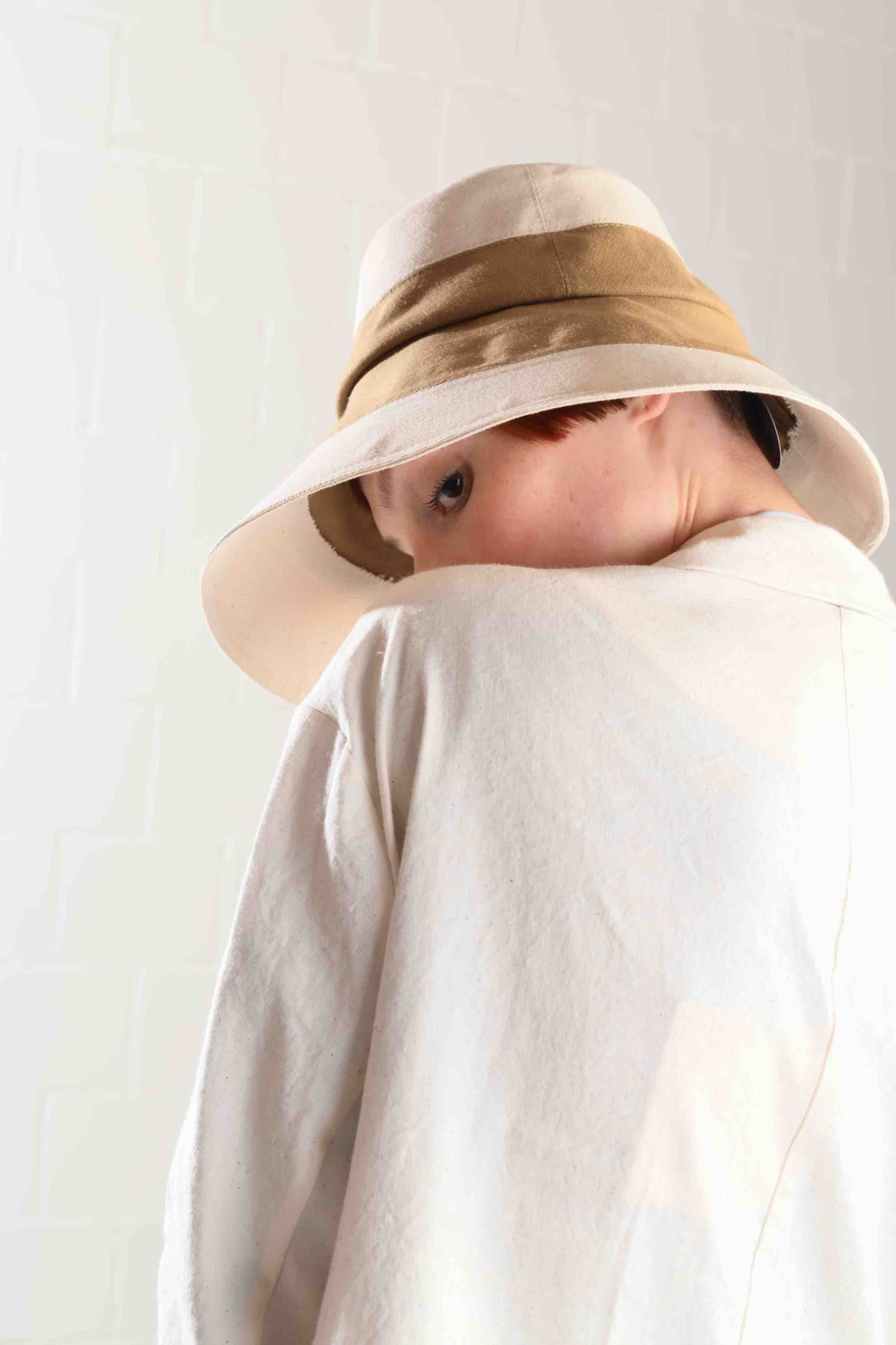 Medium-brimmed cotton fedora hat by Lola Hats, designed for travel and breezy weather, handcrafted in Brooklyn. Available at House of Woven Stories.