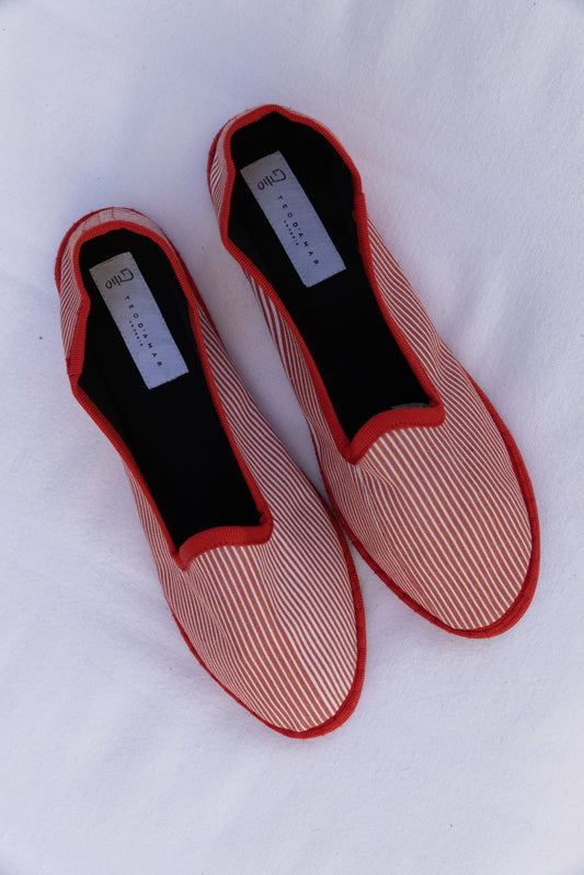Red White Striped Venetian Slippers by Teod’amar, handmade in Venice from upcycled luxury fabrics and recycled bicycle tyres. Unique, eco-conscious, and timelessly elegant.