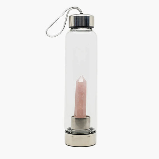 Rose Quartz Crystal Water Bottle by The Goddess Collective, featuring a natural crystal obelisk inside a glass bottle with stainless steel lids and carry sleeve.
