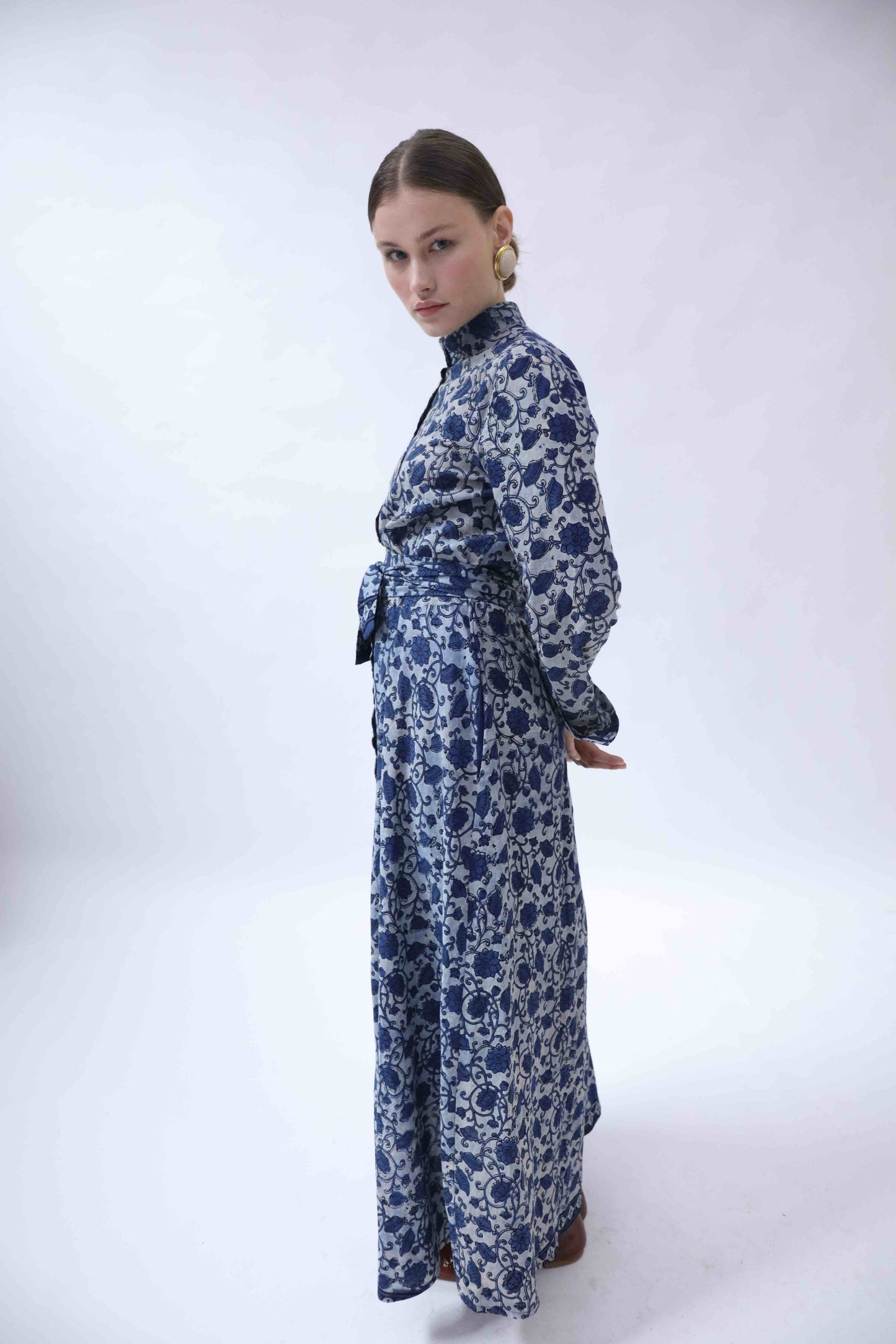 Silk shirt dress with Ajrakh block print by Obidi, crafted from upcycled antique saris. Features a mandarin collar, side pockets, and matching belt. Handcrafted, one-of-a-kind piece from the House of Woven Stories collection.