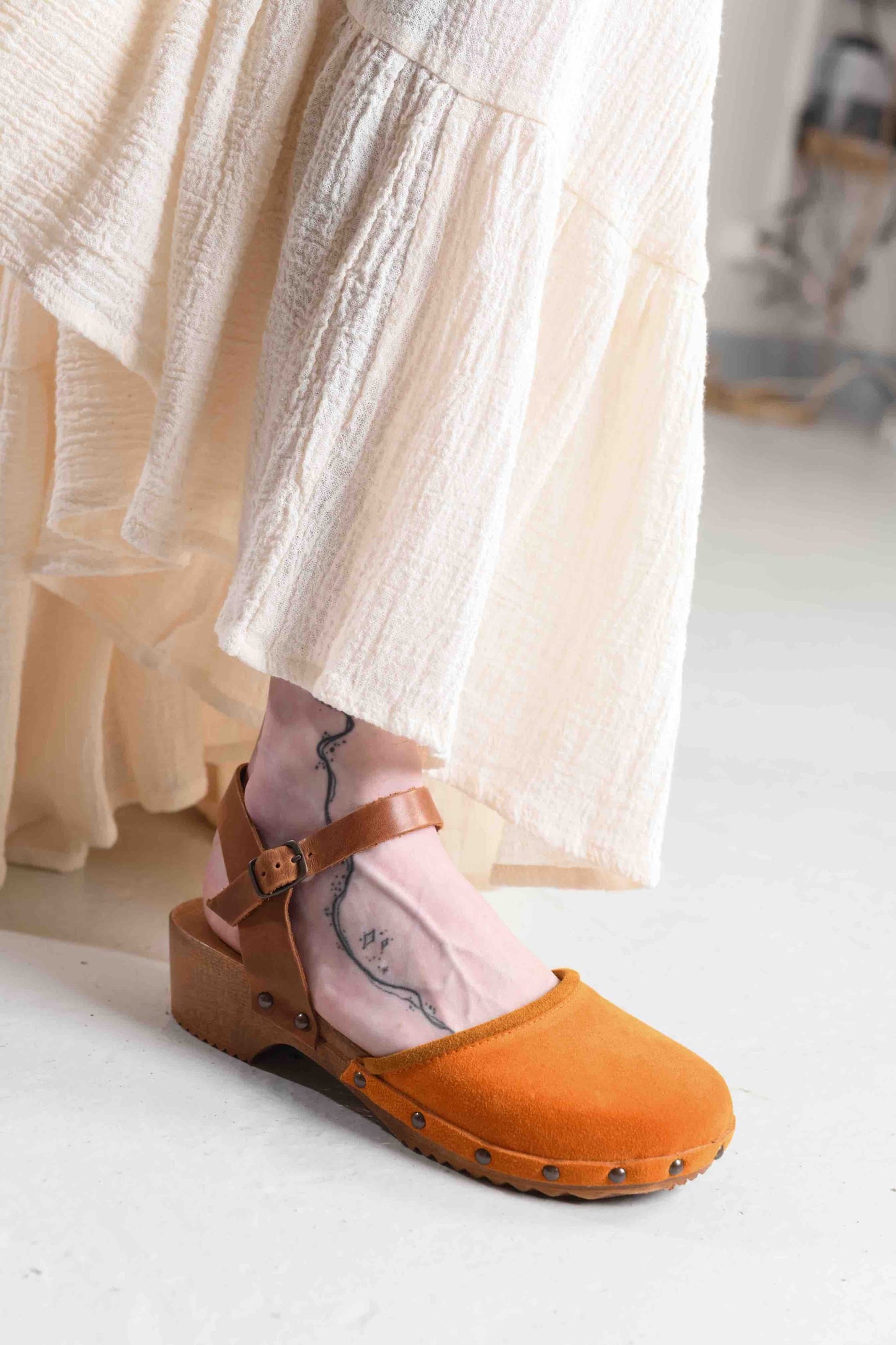 Tea Tangerine velvet ballerina clogs with amber trim and wooden sole by Antidoti, handmade in Italy. Part of House of Woven Stories selection.
