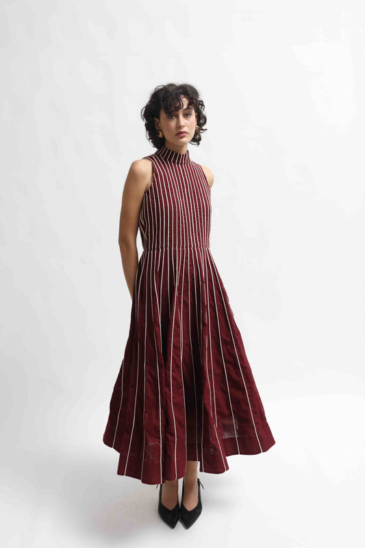 Thakur Dress by Ka-Sha – long striped hand-dyed Kala Cotton dress with front-open design. A sustainable, artisanal piece blending tradition and modern style. Part of House of Woven Stories selection.
