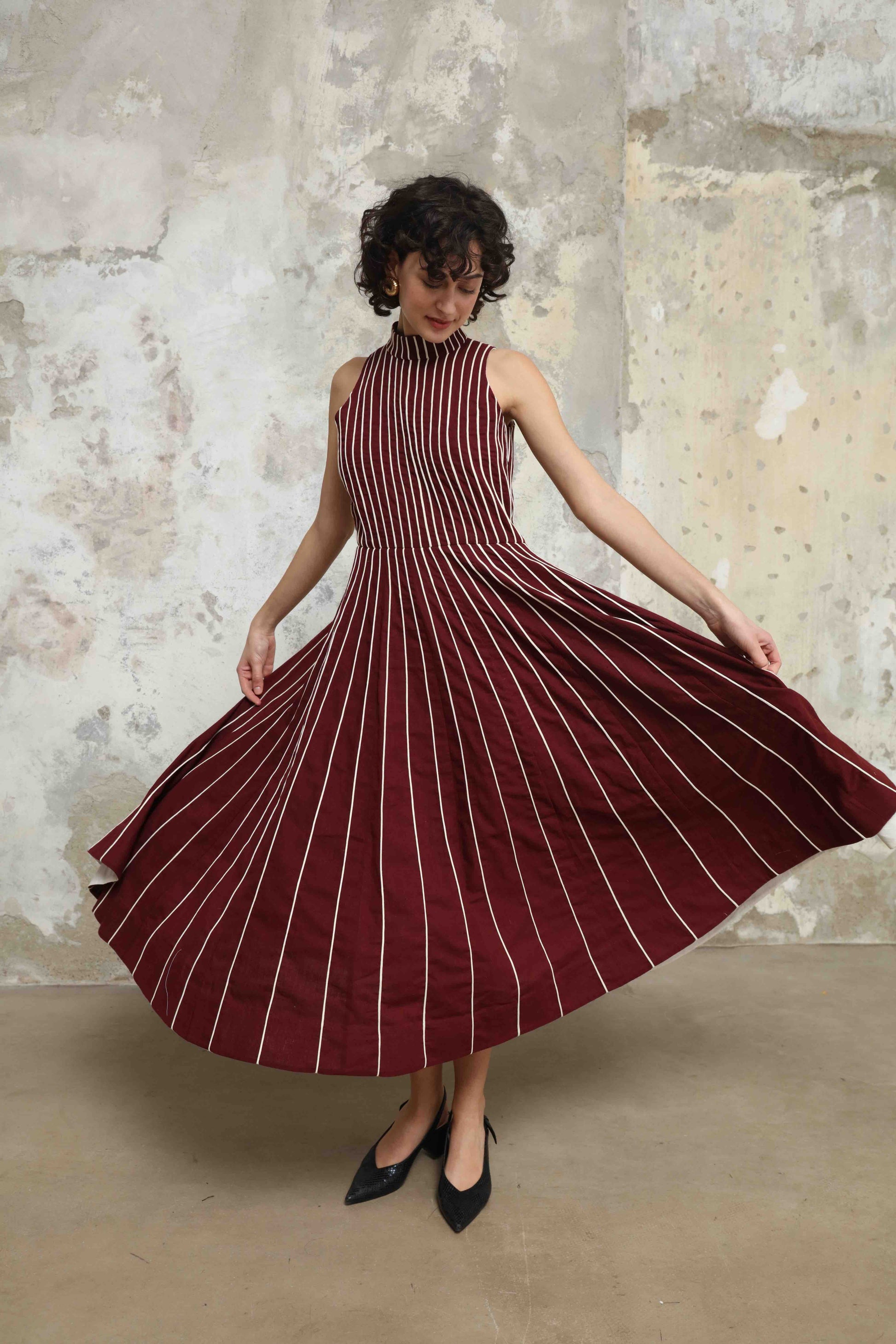 Thakur Dress by Ka-Sha – long striped hand-dyed Kala Cotton dress with front-open design. A sustainable, artisanal piece blending tradition and modern style. Part of House of Woven Stories selection.