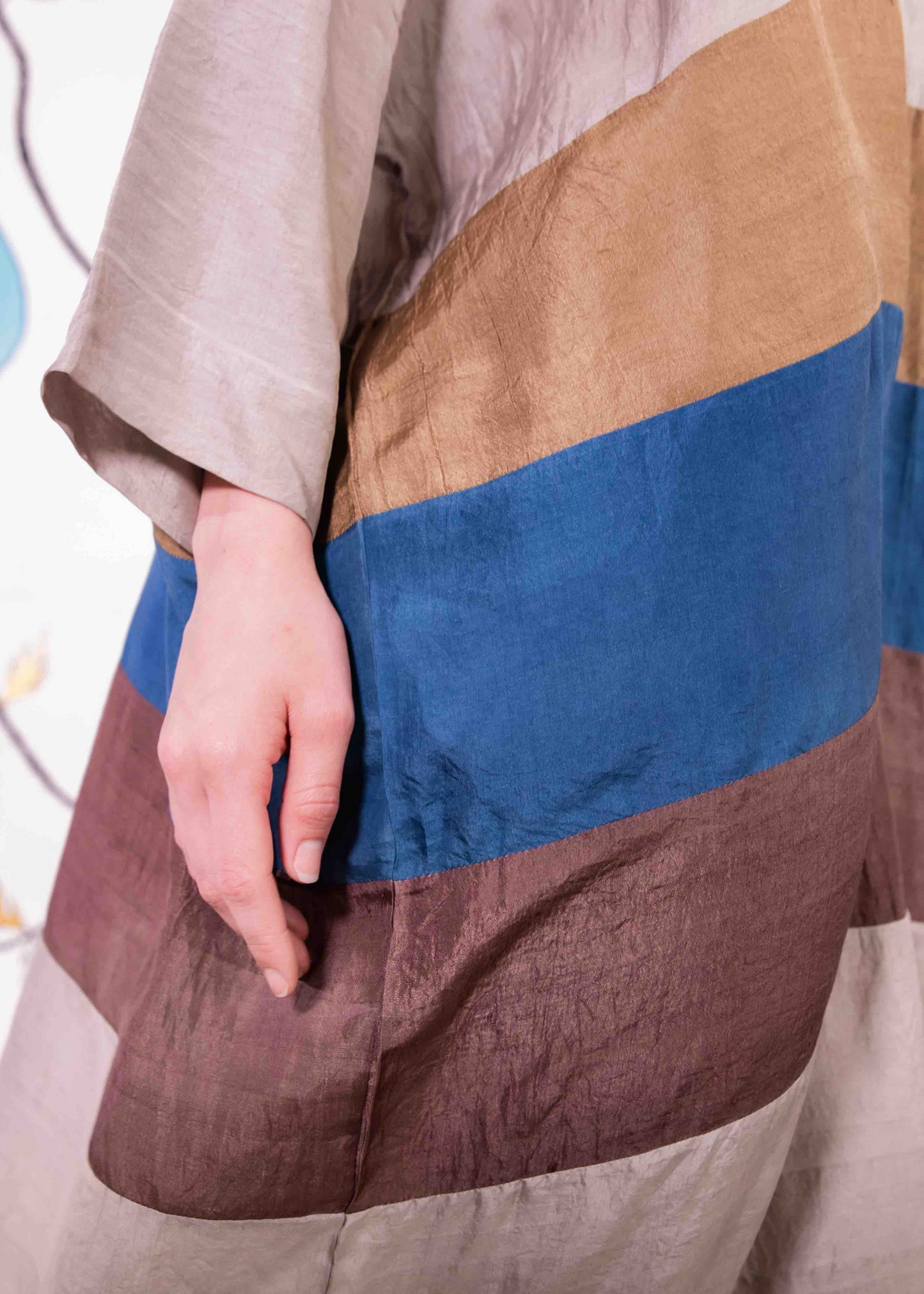 Ankle-length colour-blocked blouson dress by A Sacred Wrap, featuring hand-dyed botanical hues in patchwork design. Made in Mumbai from natural fibers, combining fluid silhouette with ethical craftsmanship.