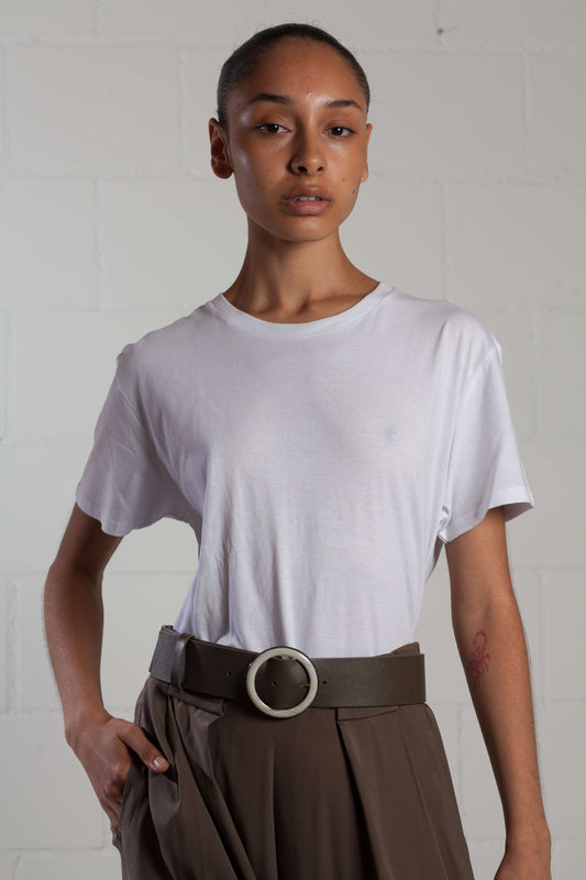 Unisex seamless T-shirt made from certified organic cotton by House of Woven Stories, featuring a minimalist design and exceptionally comfortable fit.