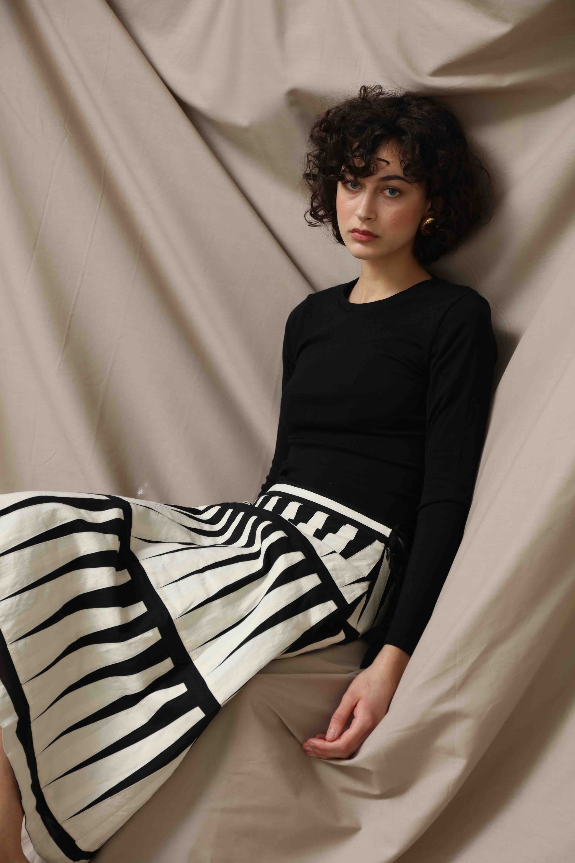 Trikon Skirt by Ka-Sha – hand-dyed cotton skirt with black and white applique details, zip and drawstring closure for adjustable fit. Part of House of Woven Stories selection.
