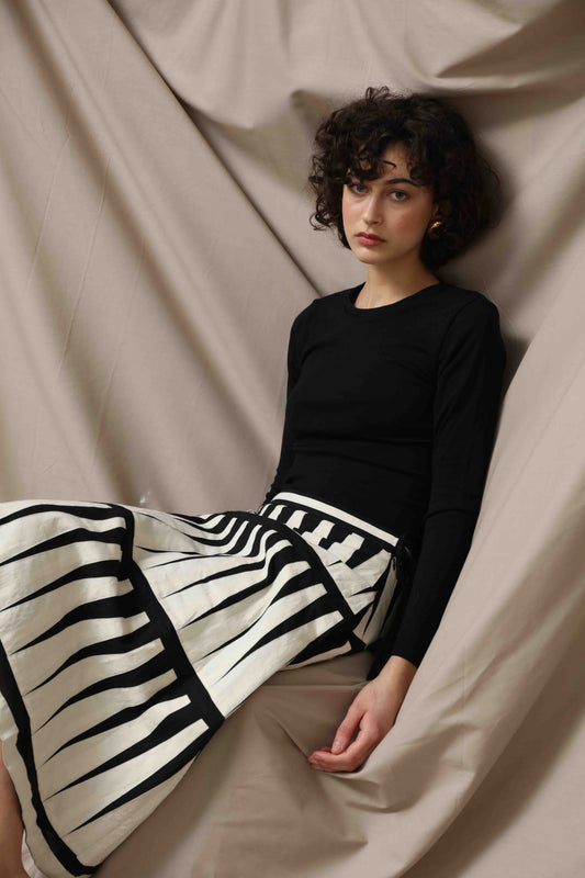 Trikon Skirt by Ka-Sha – hand-dyed cotton skirt with black and white applique details, zip and drawstring closure for adjustable fit. Part of House of Woven Stories selection.