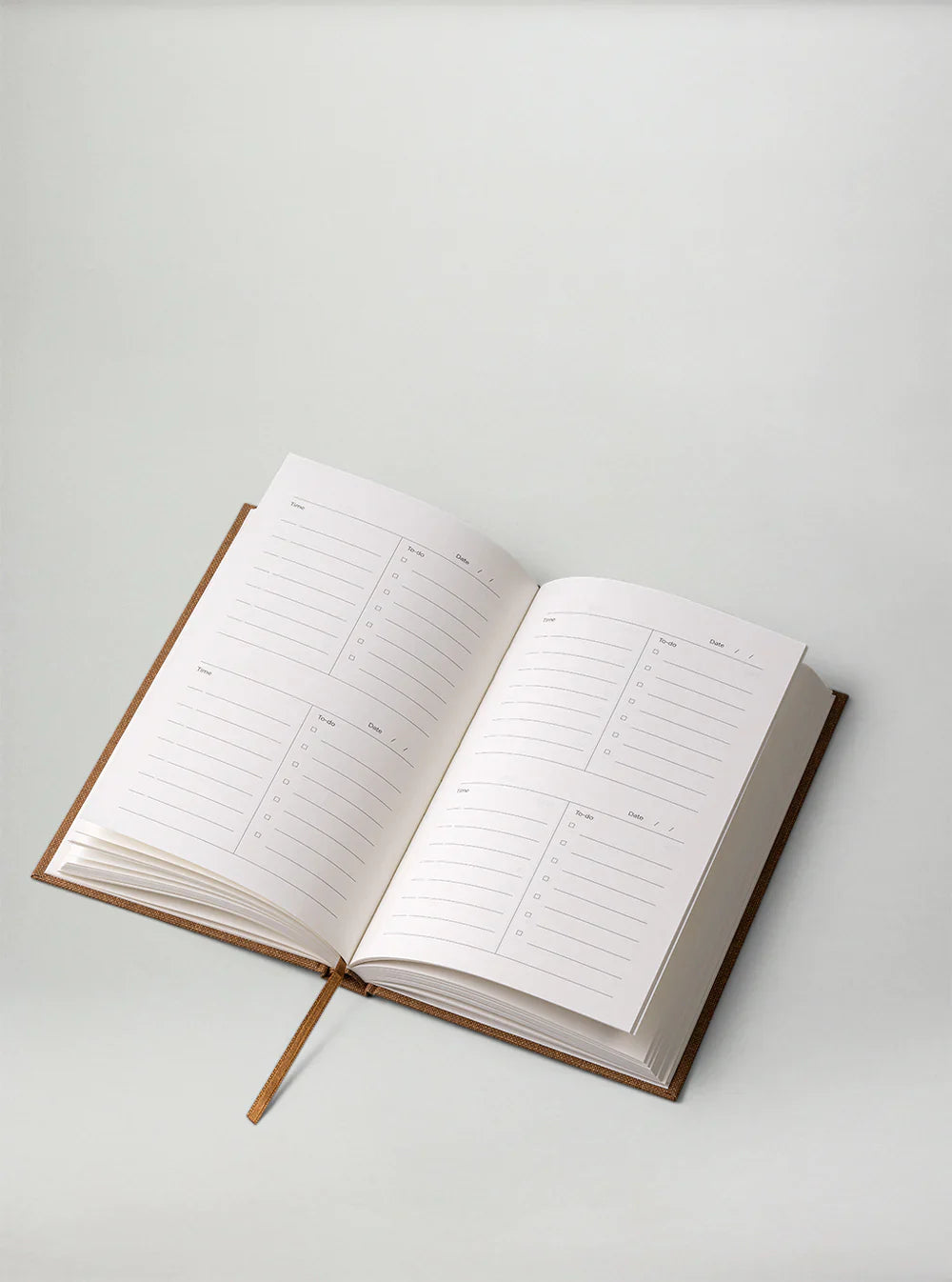 Sand Yearly Planner by New Mags, undated minimalist planner with monthly and daily pages.