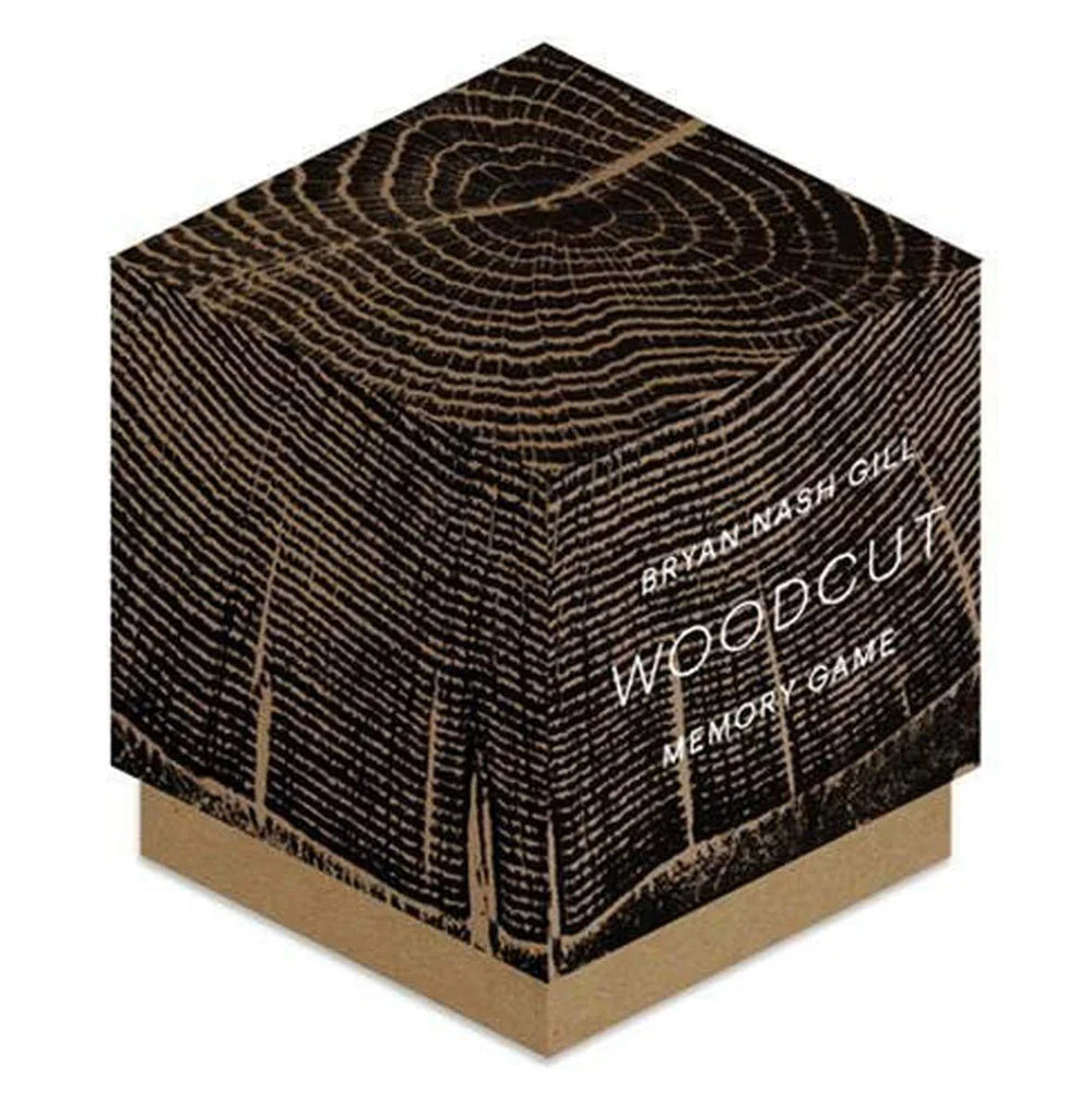 Woodcut Memory Game by New Mags featuring 52 matching cards with intricate tree ring designs
