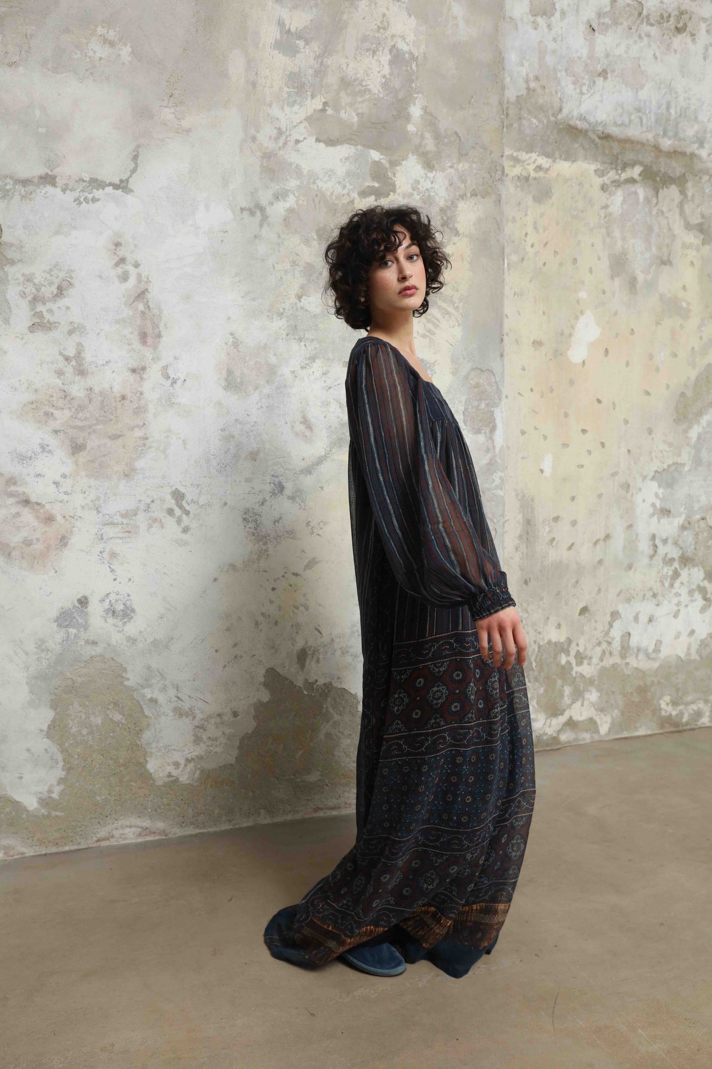 Woodstock Dress by House of Woven Stories - long dress in 100% cotton gauze, crafted from handprinted sari patchwork with intricate Ajrakh block prints. Lightweight, flowing, artisanal, and one-of-a-kind.
