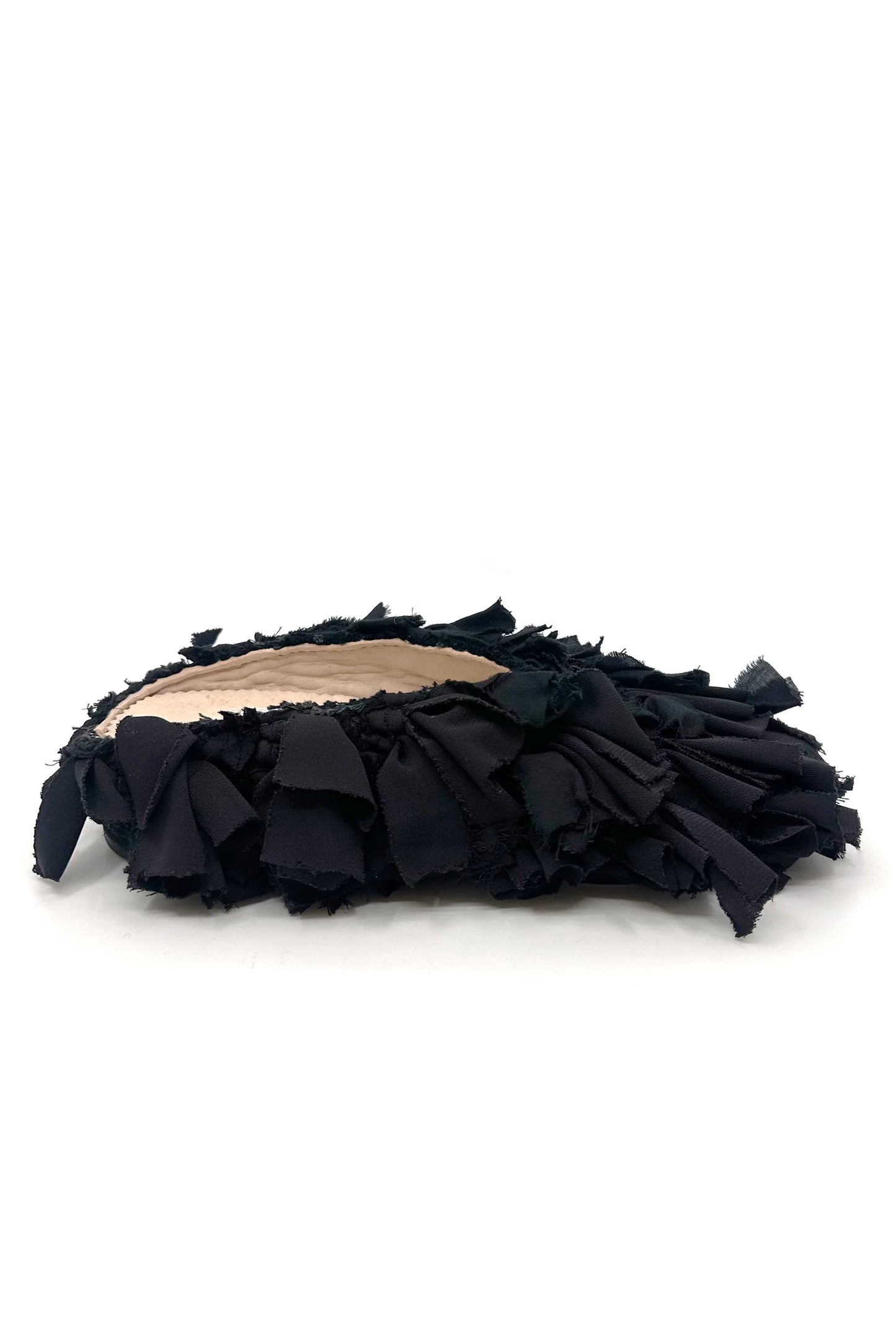 Aili Black Mono Babouches by Calla, entirely black handmade Moroccan slippers from upcycled Berber rugs, available at House of Nomad Stories