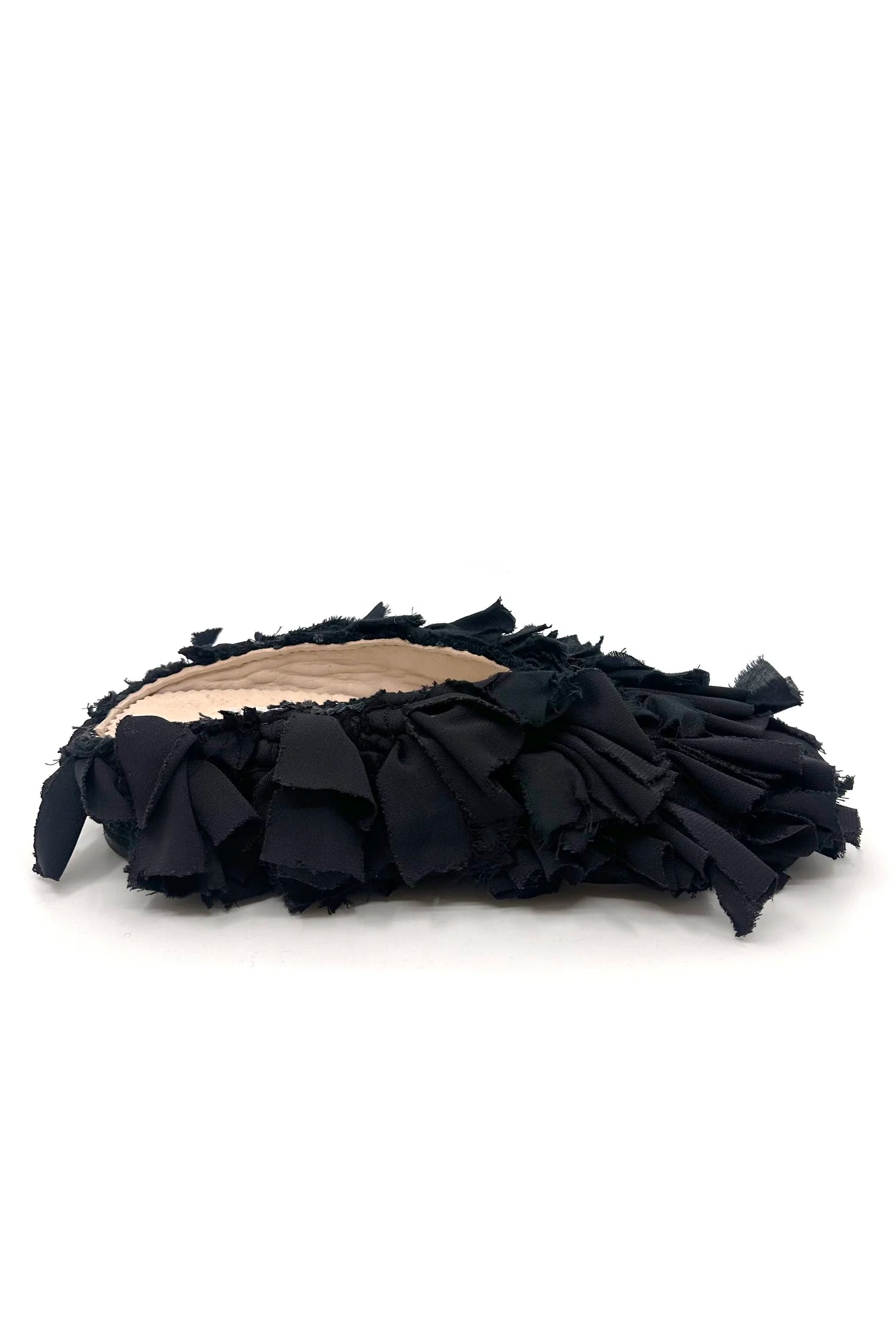 Aili Black Mono Babouches by Calla, entirely black handmade Moroccan slippers from upcycled Berber rugs, available at House of Nomad Stories