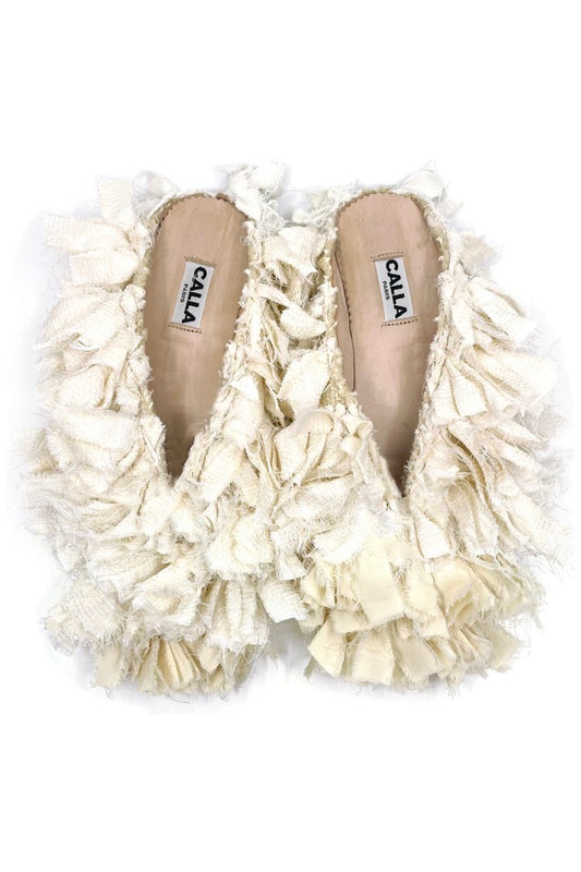 Aili Ecru Mono Babouches by Calla, handmade Moroccan slippers in soft ecru from upcycled Berber rugs, available at House of Nomad Stories