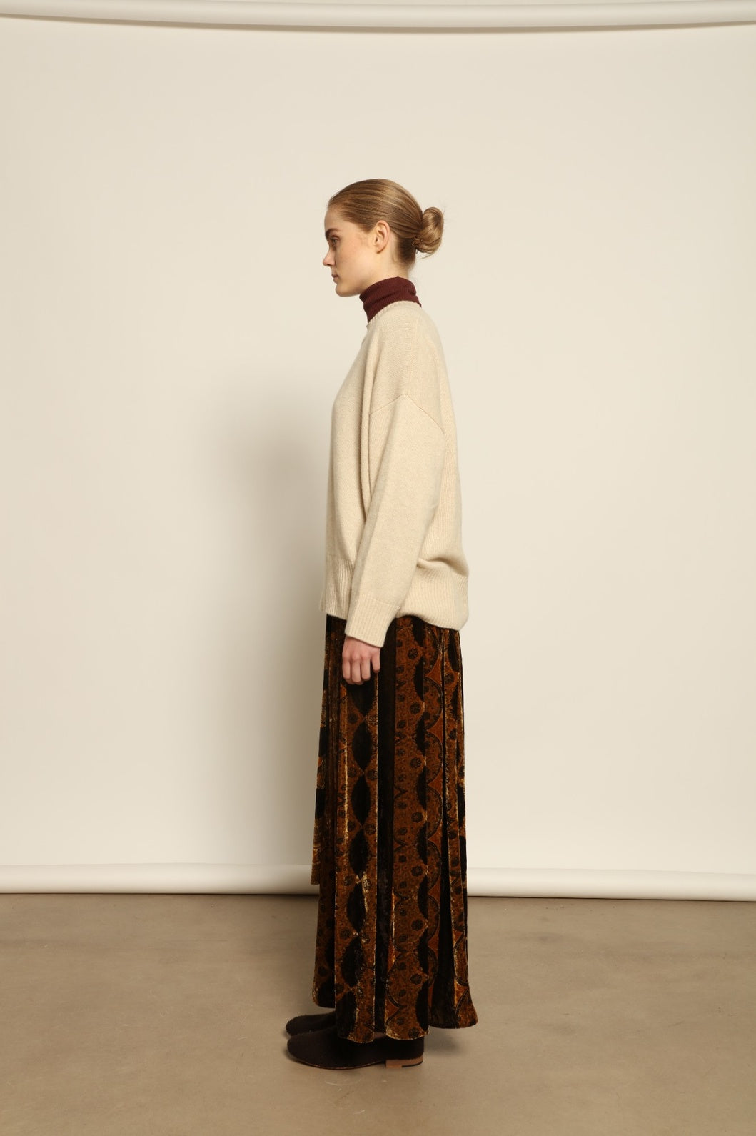Model is wearing the Ambra Mauri Skirt by Obidi, made from premium flowing fabric with a flattering silhouette, combining contemporary design with traditional craftsmanship.