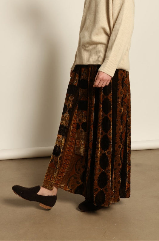 Model is wearing the Ambra Mauri Skirt by Obidi, made from premium flowing fabric with a flattering silhouette, combining contemporary design with traditional craftsmanship.