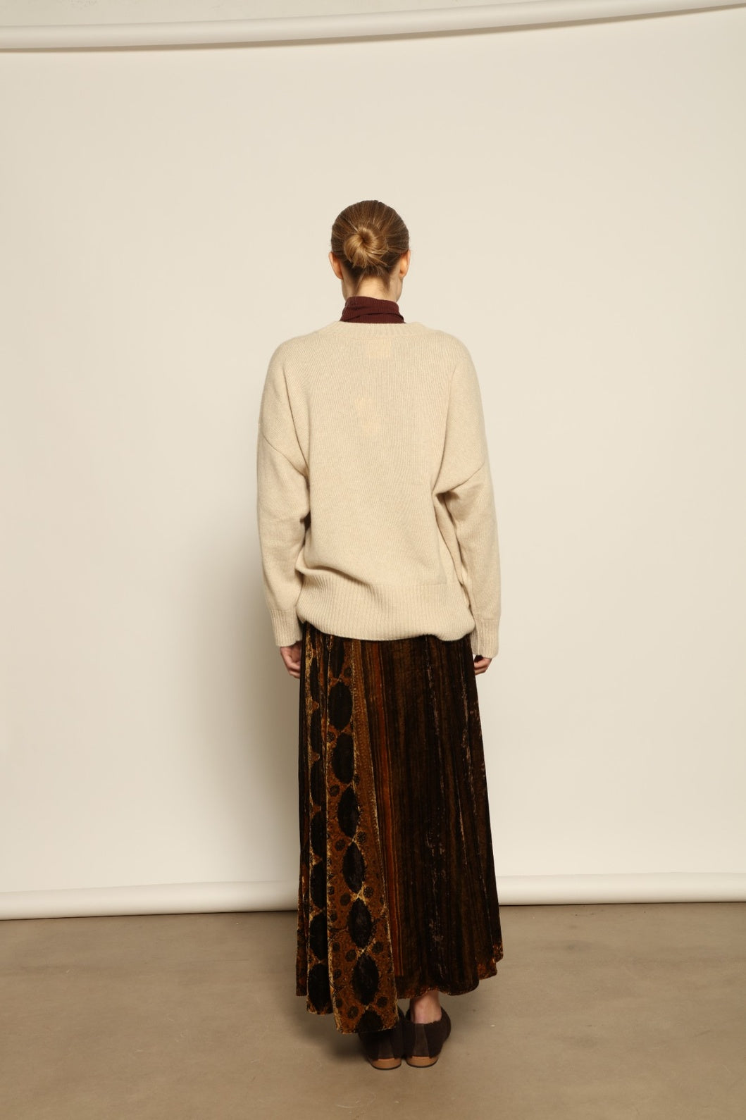 Model is wearing the Ambra Mauri Skirt by Obidi, made from premium flowing fabric with a flattering silhouette, combining contemporary design with traditional craftsmanship.