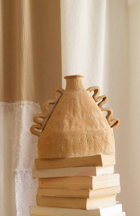 Handbuilt Amphora Soleil in sun-toned chamotte clay by Clandestine Céramique, featuring sculptural handles and a textured surface, available at House of Woven Stories.