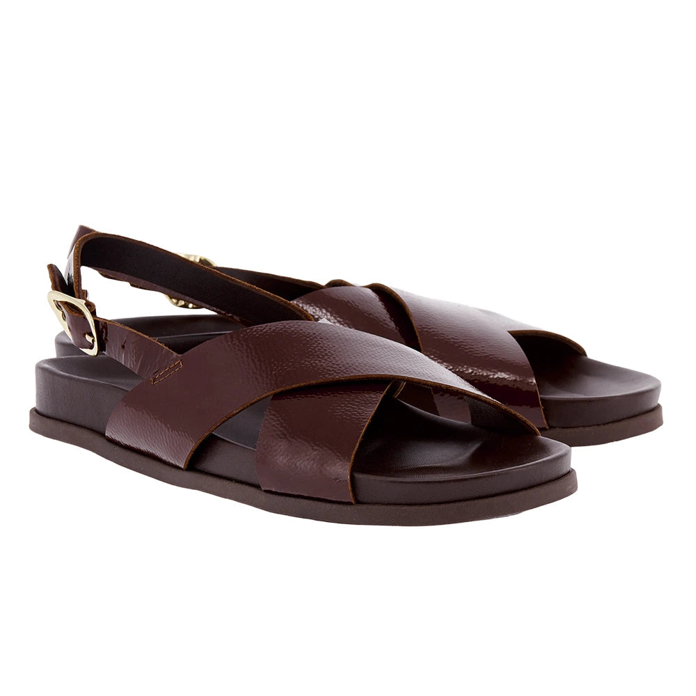 Ikesia Sandals in chocolate naplak leather by Ancient Greek Sandals, handmade in Greece with anatomical footbed and winged buckle, part of the House of Nomad Stories selection