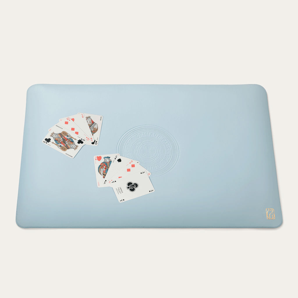 Apple Leather Playing Mat by Grimaud Paris from the House of Woven Stories selection, crafted in Dolphin Blue apple leather, designed in France as a luxury card game mat for refined play, shuffle, and leisure moments.