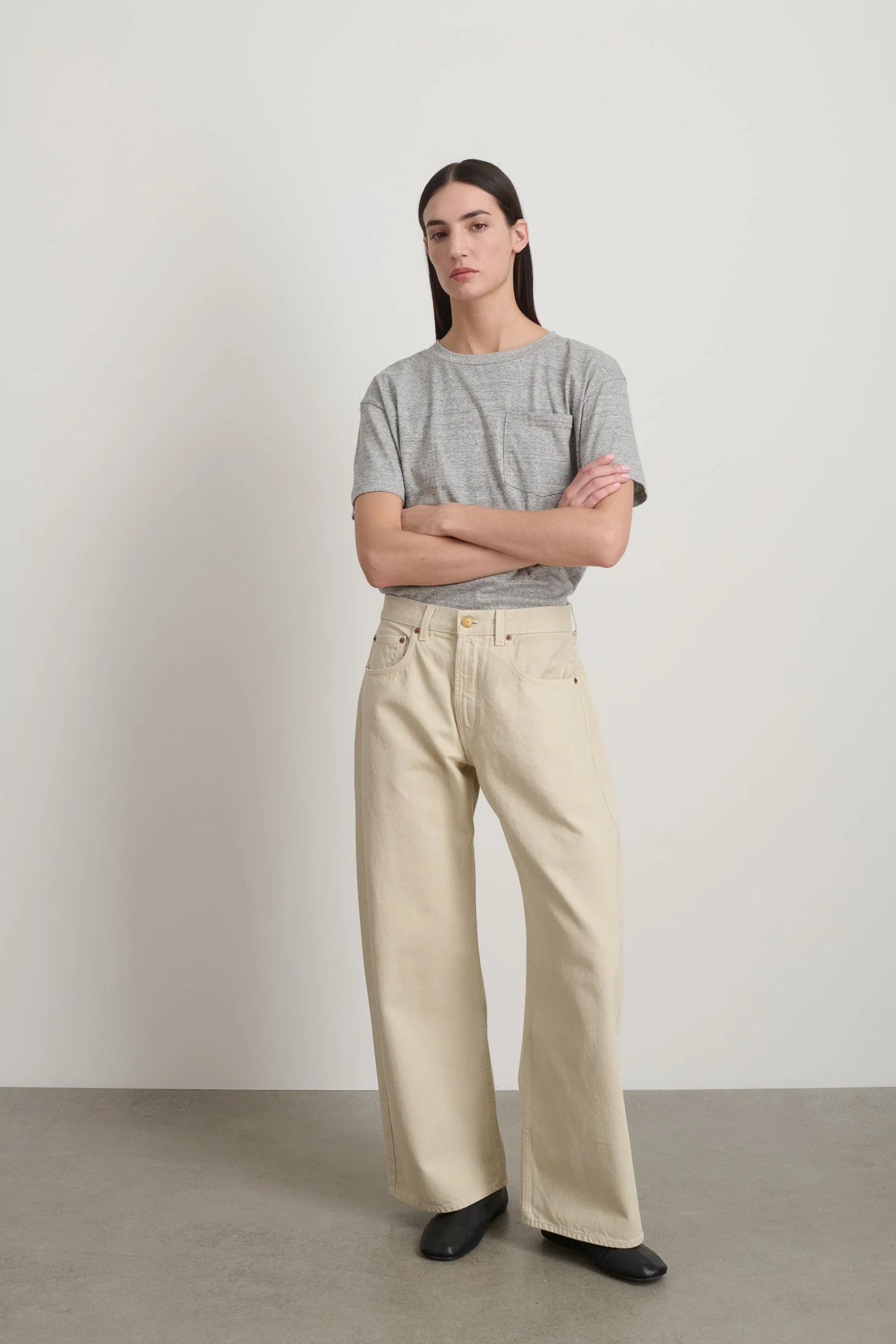 Model is wearing B Sides Floppy Jean Chalk Overdye in wide-leg cotton denim, mid-rise relaxed fit, 28-inch inseam, stonewashed chalk finish, from the curated selection of House of Woven Stories