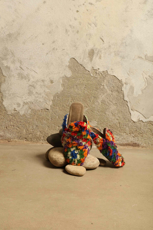 Baboush Fringed Majorel in Multicolor by House of Woven Stories, handcrafted in Marrakesh with colorful hand-tied fringe, cushioned insole, and ethically sourced leather, showcasing vibrant Moroccan craftsmanship.