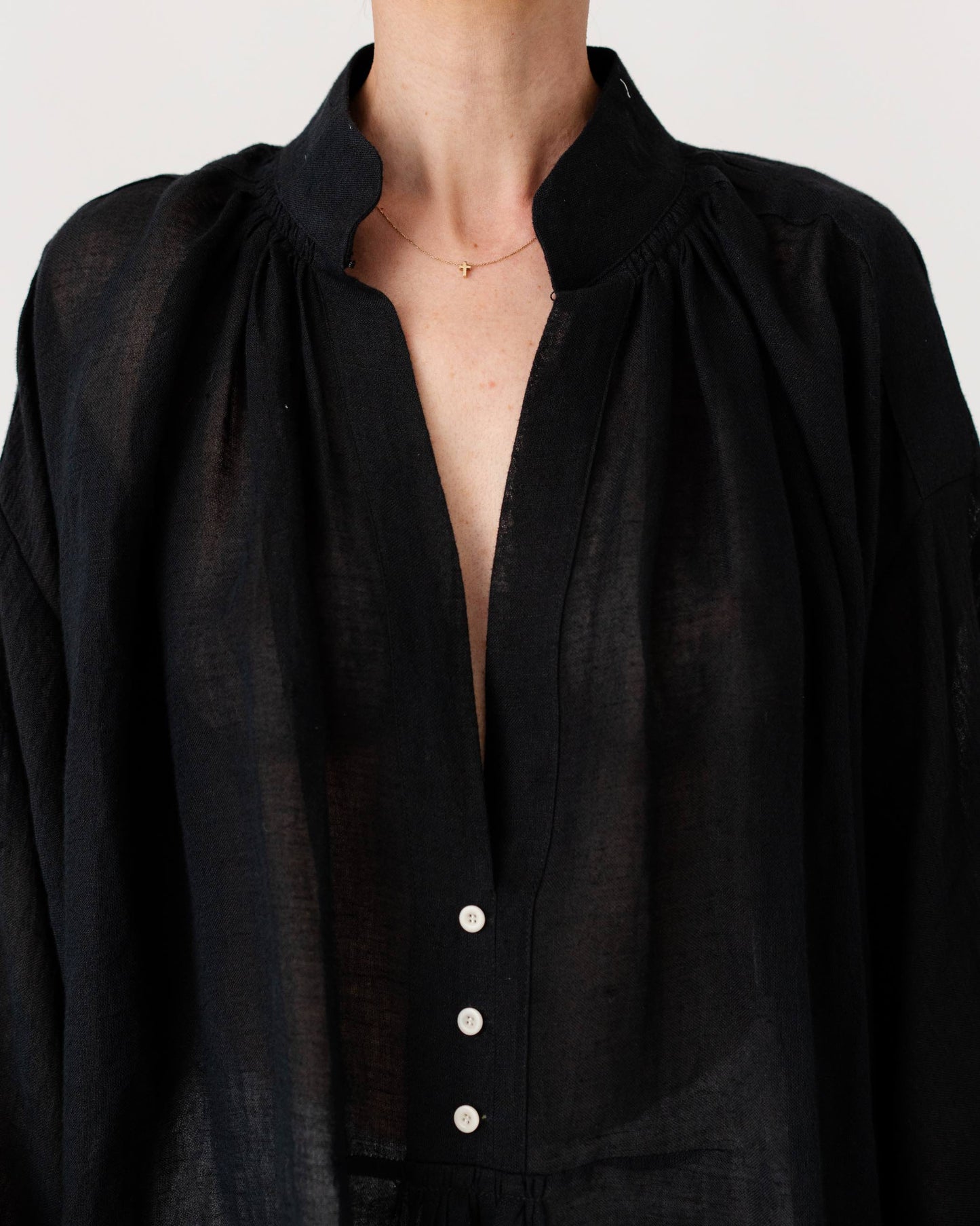 Black Sea Linen Shirt by Les Vacances d’Irina, oversized semi-sheer linen shirt with voluminous sleeves and gathered neckline, handmade in Romania.