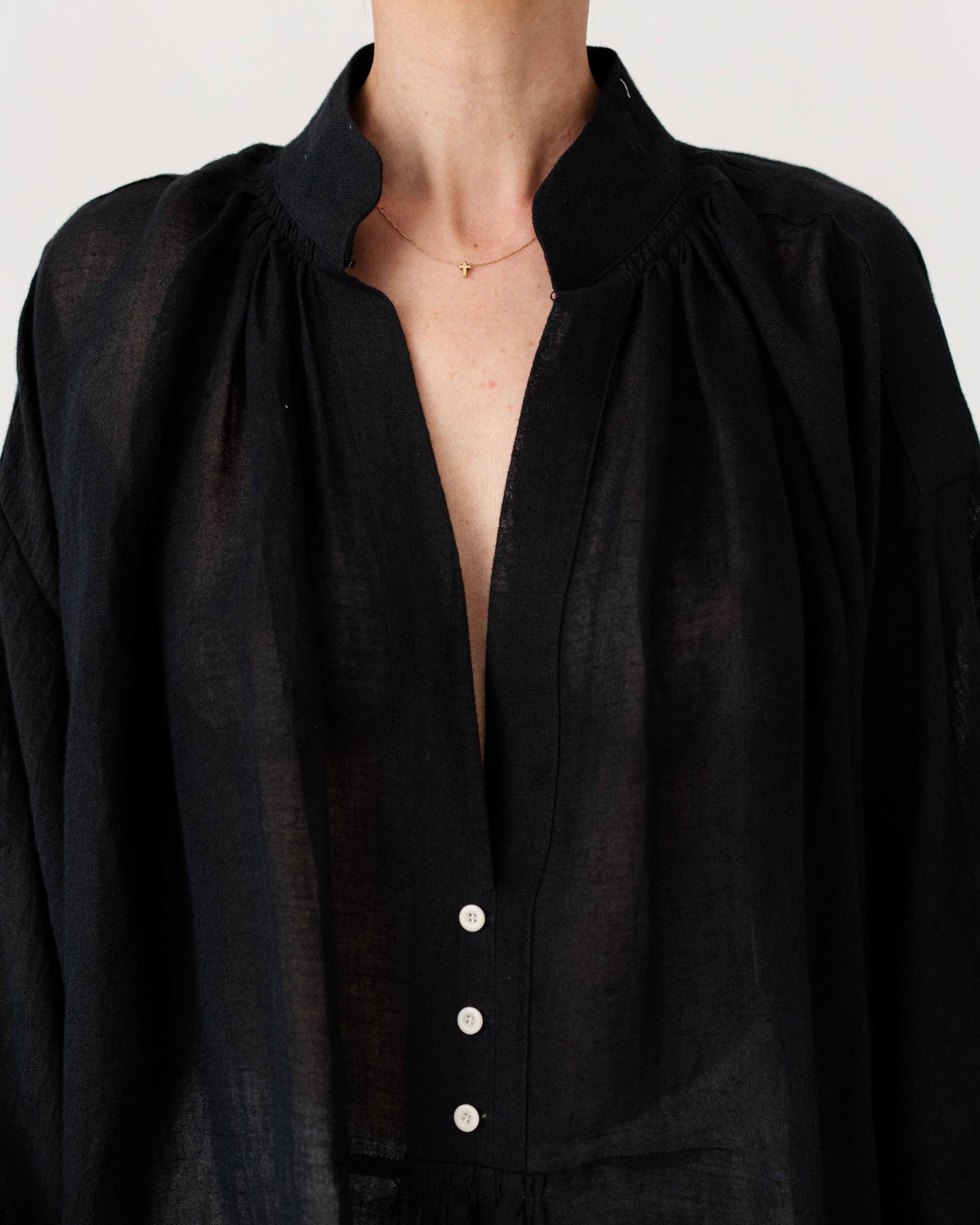 Black Sea Linen Shirt by Les Vacances d’Irina, oversized semi-sheer linen shirt with voluminous sleeves and gathered neckline, handmade in Romania.
