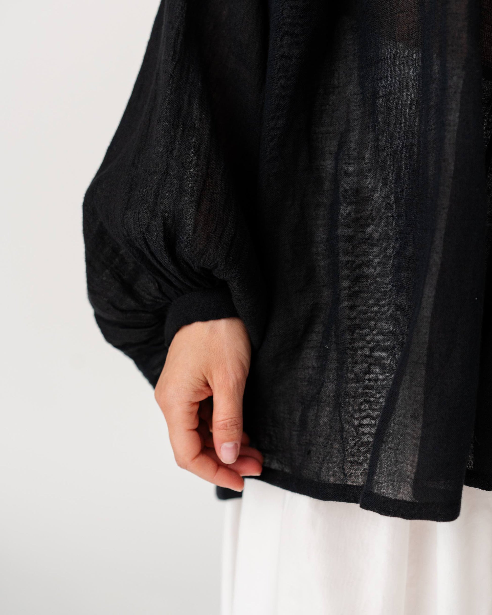 Black Sea Linen Shirt by Les Vacances d’Irina, oversized semi-sheer linen shirt with voluminous sleeves and gathered neckline, handmade in Romania.
