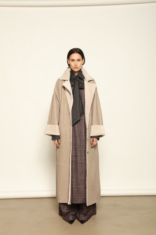Charlotte Grey Sud Africa Astracan Nappa Coat by Novelle – reversible Italian shearling and leather coat in natural greige tone, handcrafted from astrakhan nappa and wool for timeless elegance and sustainable luxury at House of Woven Stories.