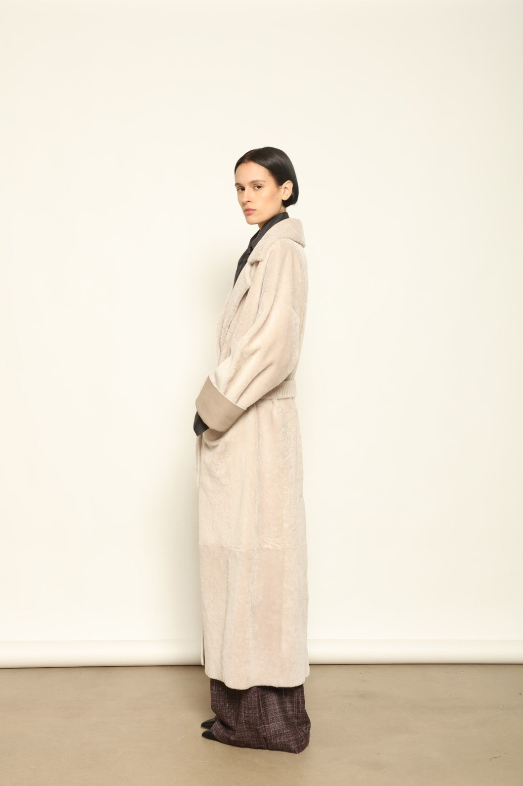 Charlotte Grey Sud Africa Astracan Nappa Coat by Novelle – reversible Italian shearling and leather coat in natural greige tone, handcrafted from astrakhan nappa and wool for timeless elegance and sustainable luxury at House of Woven Stories.