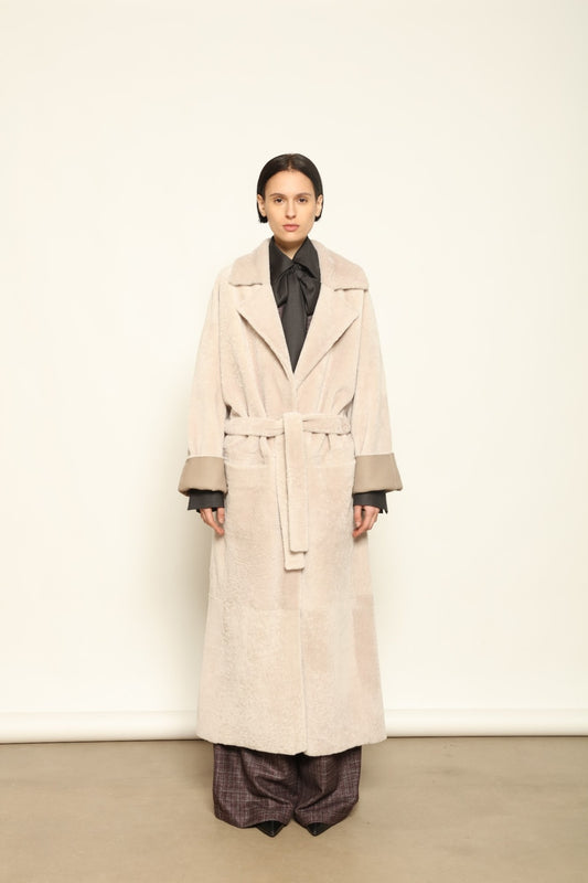 Charlotte Grey Sud Africa Astracan Nappa Coat by Novelle – reversible Italian shearling and leather coat in natural greige tone, handcrafted from astrakhan nappa and wool for timeless elegance and sustainable luxury at House of Woven Stories.