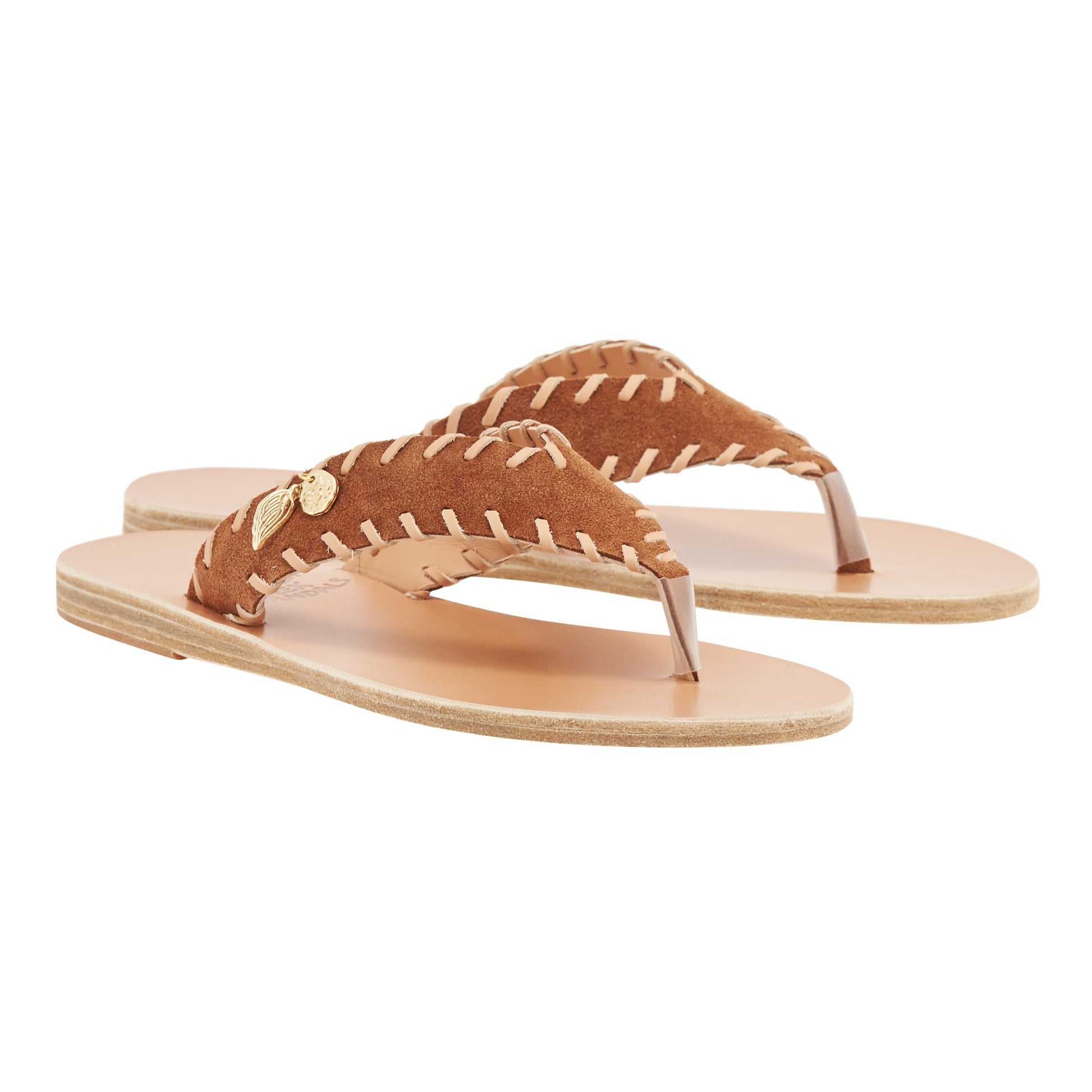 Charys Stitch Crosta Sandals in rust suede by Ancient Greek Sandals, handmade in Greece with hand-stitched detail and metal charm, part of the House of Nomad Stories selection