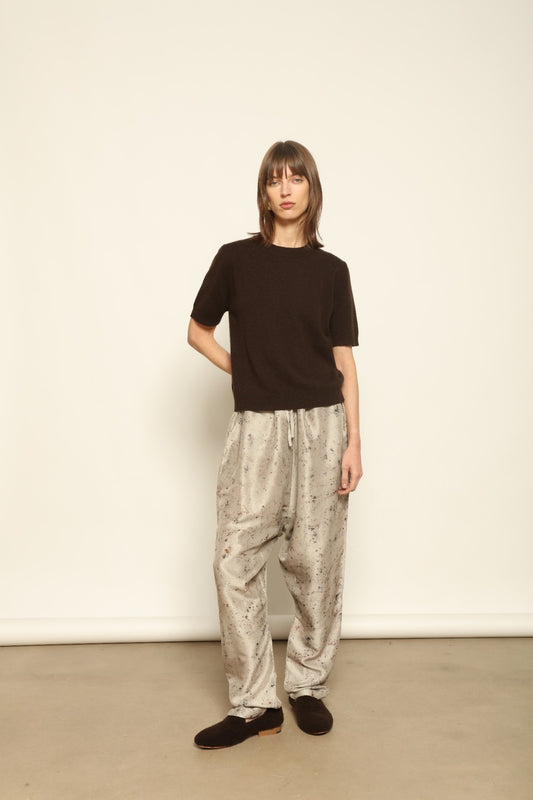 Model wearing the Chocolate Natascha Round Neck Cashmere Pullover by House of Woven Stories, crafted from 100% Inner Mongolia cashmere, featuring a relaxed fit, smooth texture, and sustainable luxury knitwear in rich chocolate tone