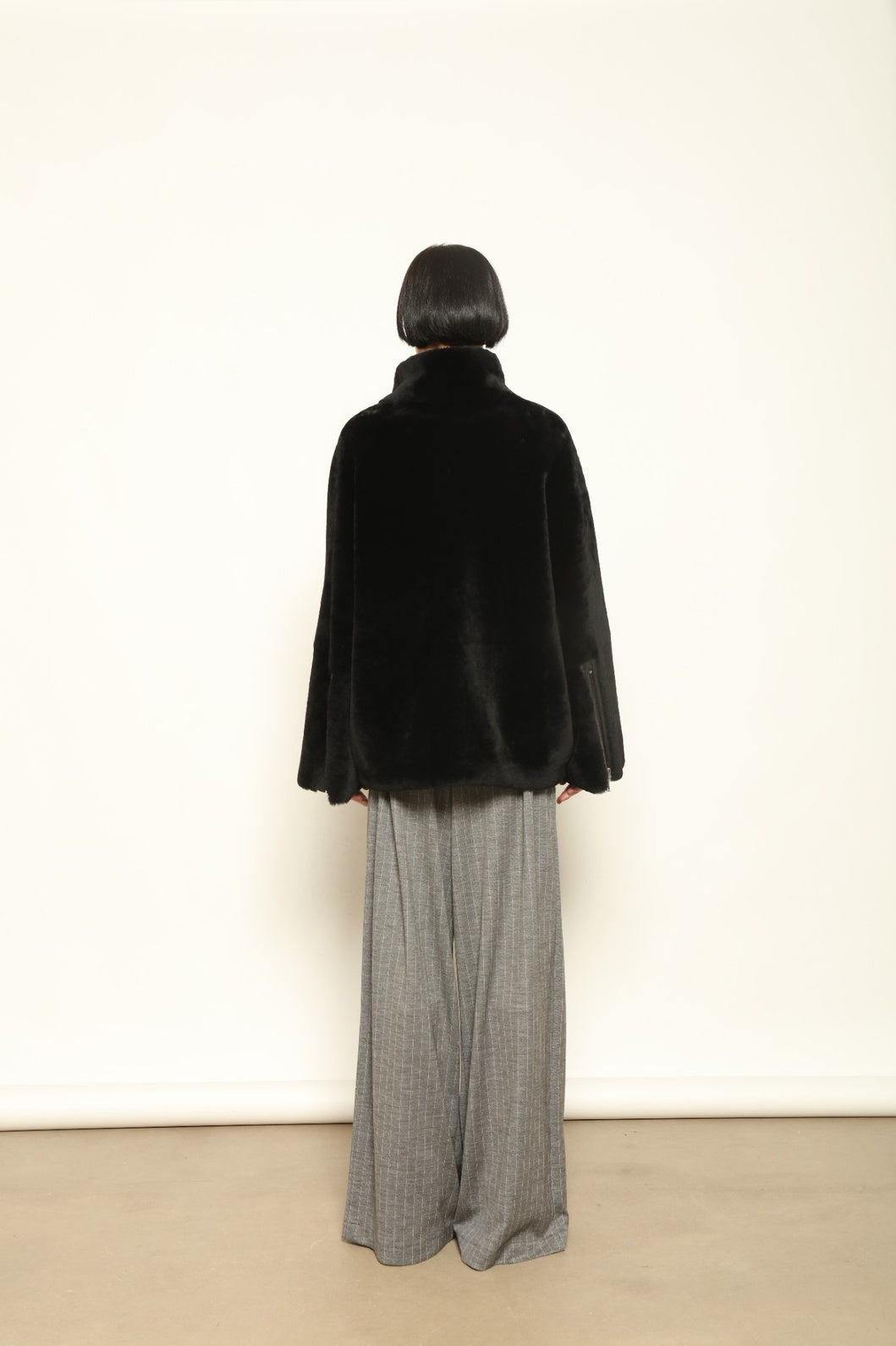 Colette Sud Africa Ironed Black Nappa Jacket by Novelle – reversible Italian shearling and nappa leather jacket in polished black, handcrafted for timeless elegance at House of Woven Stories.